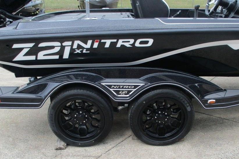 2026 Tracker Pro Guide V-16 WT boat trailer with Nitro Z21 XL branding and black wheels.