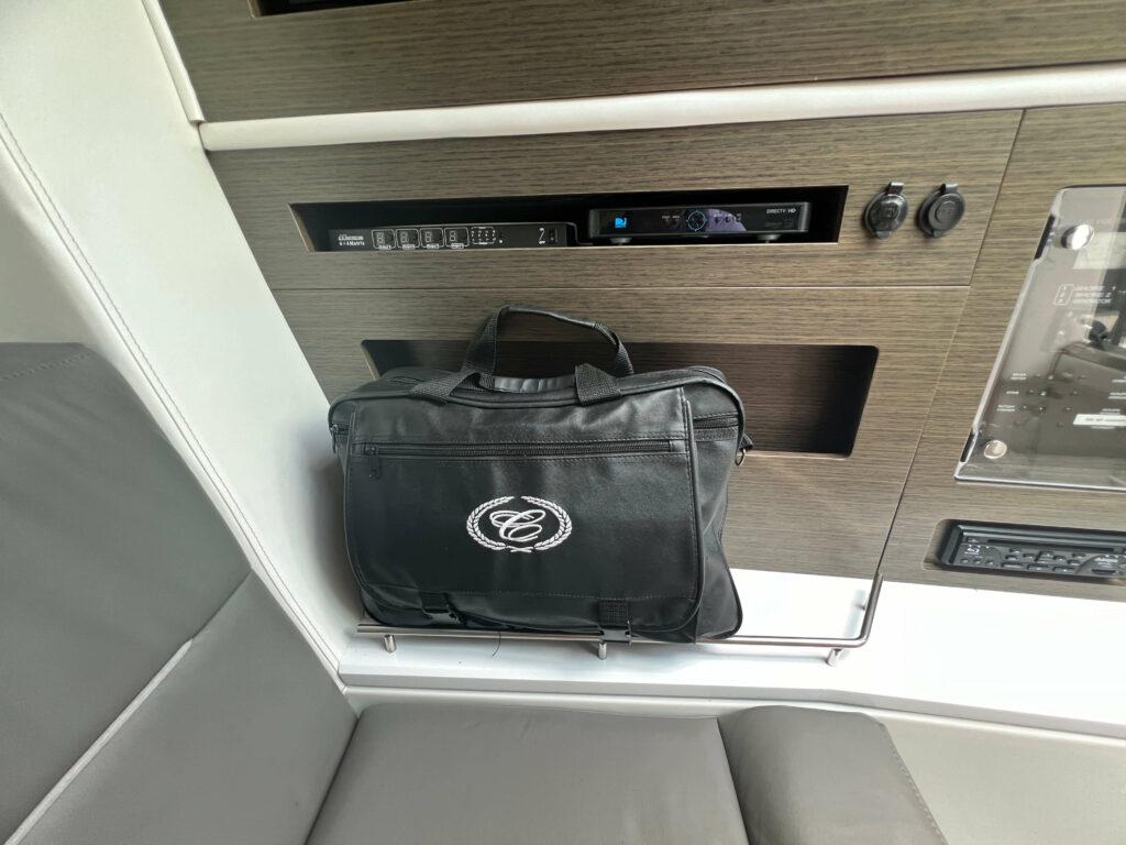 Black bag on a Cobalt A36BR 2020 boat interior with control panel.