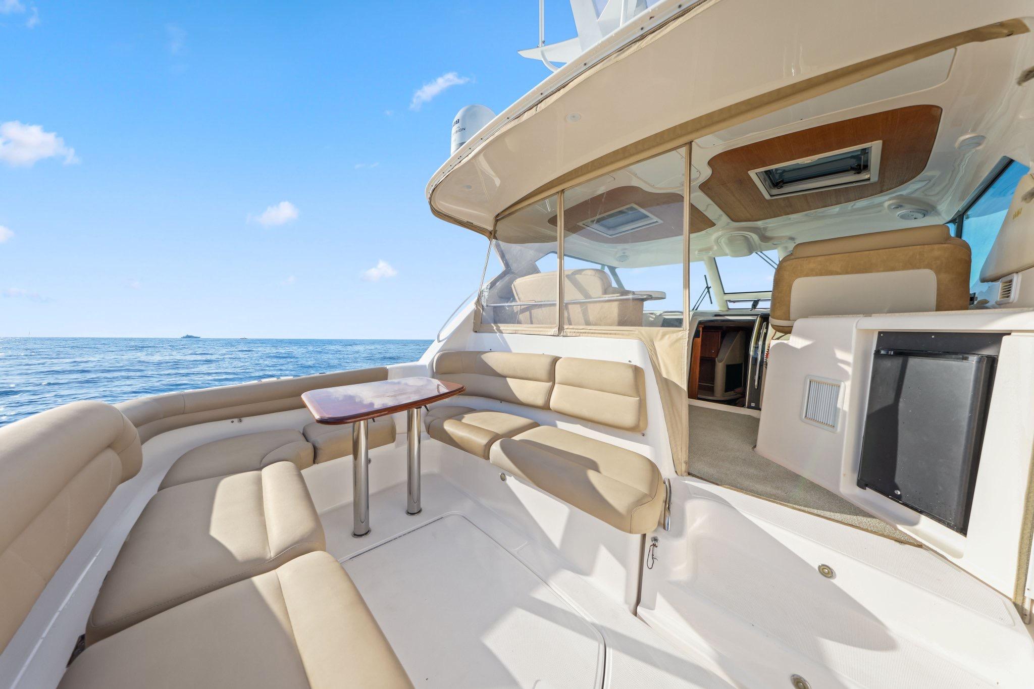 2008 Tiara Yachts 4300 Sovran interior with seating area and ocean view.
