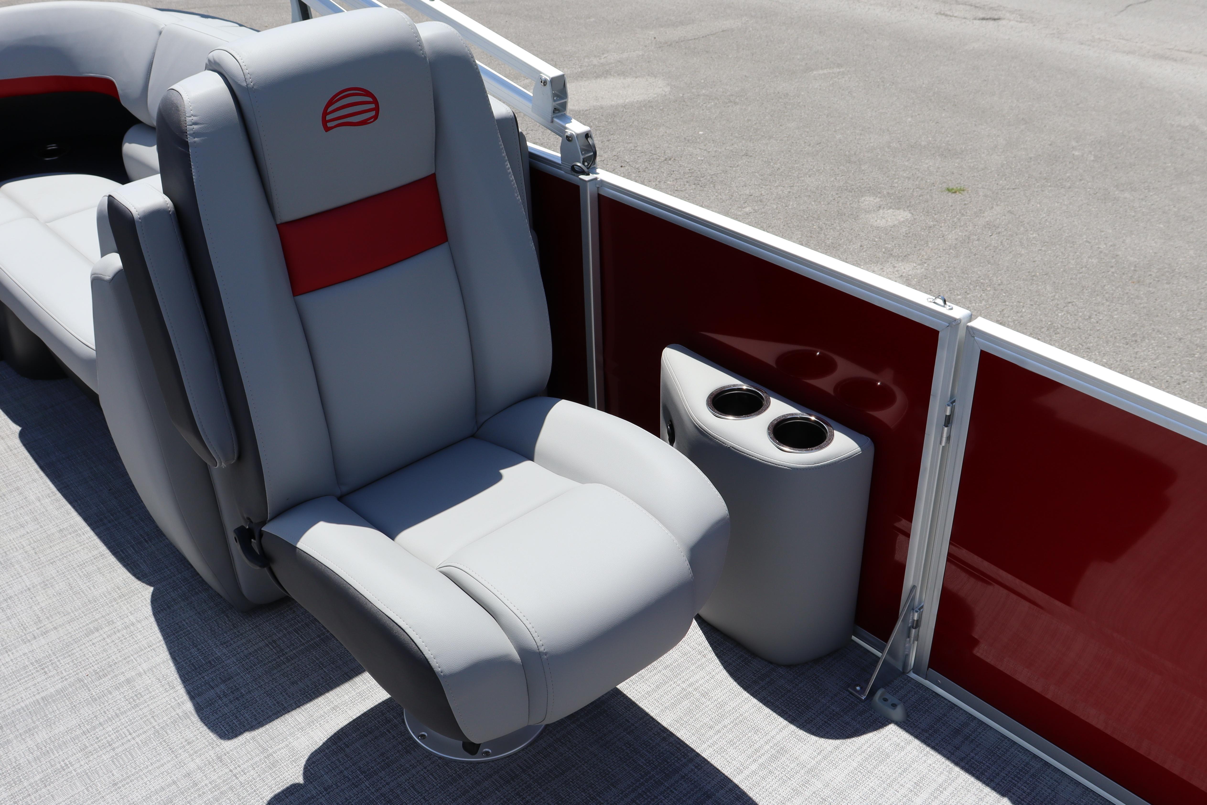 2026 Sun Tracker Party Barge 22 XP3 interior with gray seating and cup holders.
