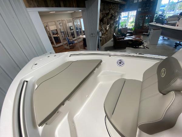 2024 Key West 189 FS boat interior with seating and storage compartments.