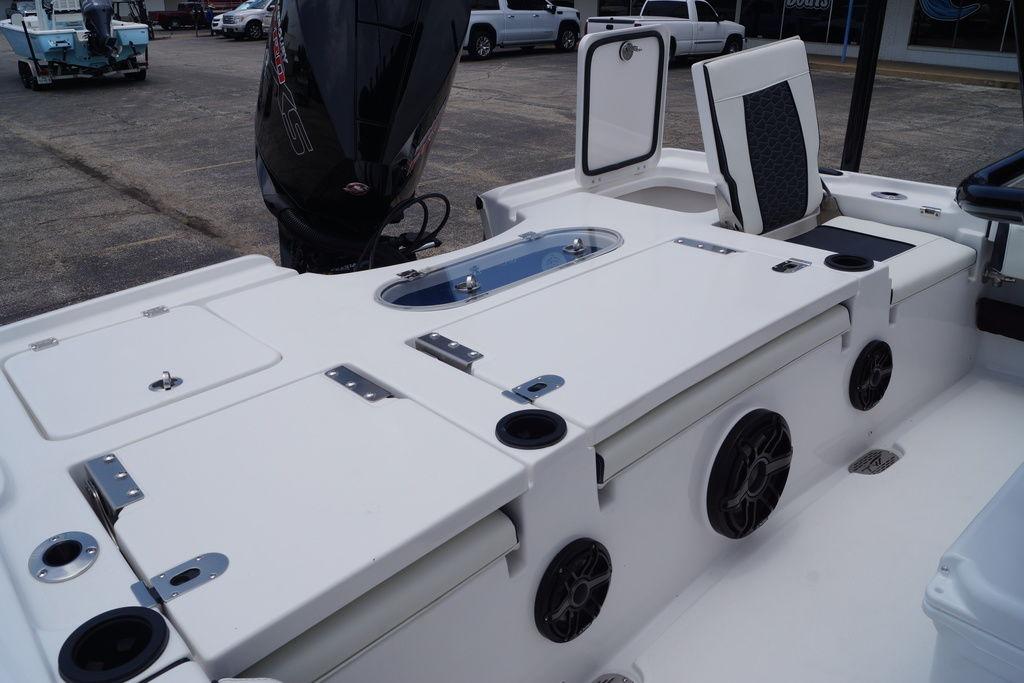2027 Tidewater 2500 Carolina Bay boat interior with seating, storage, and motor.