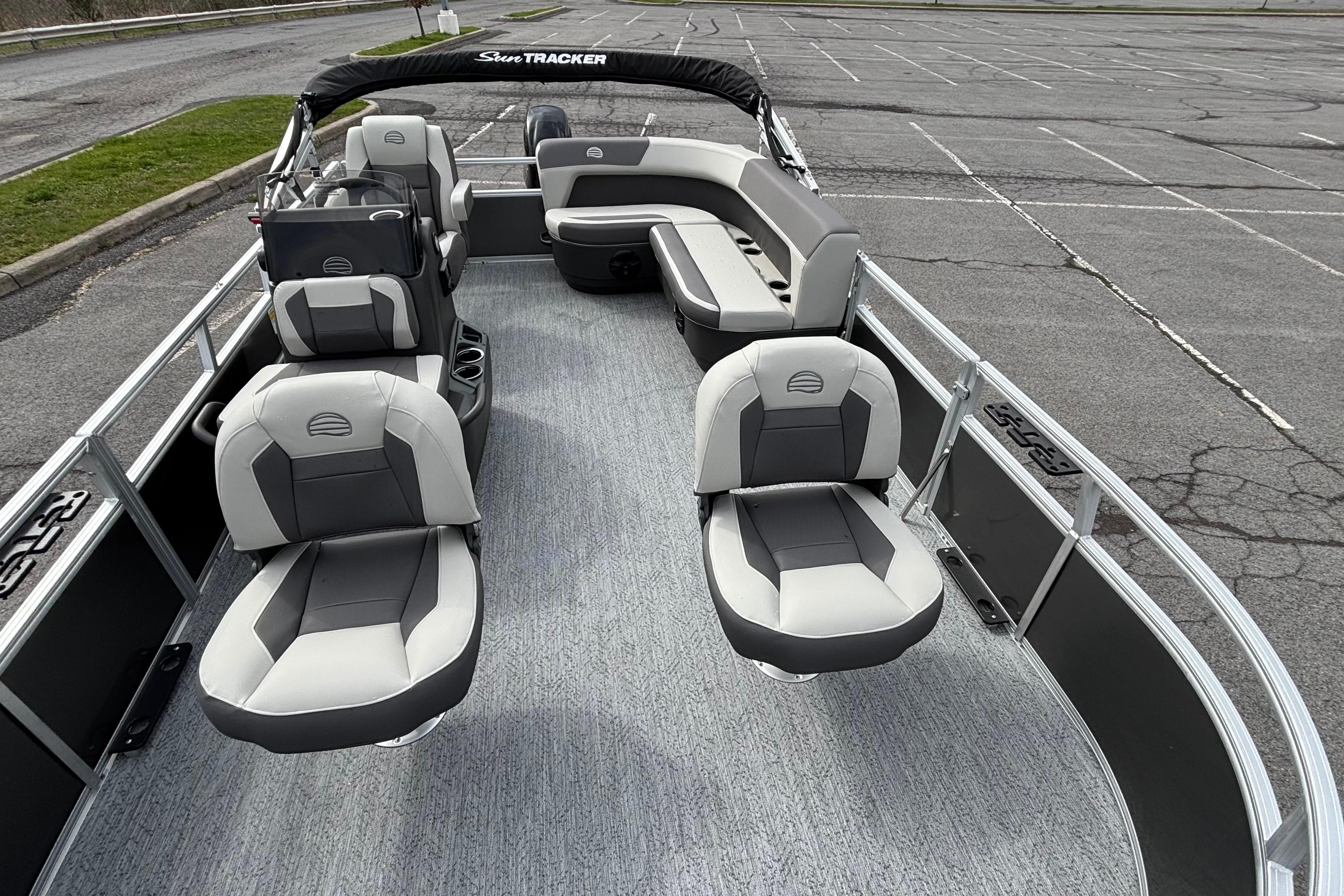 2026 Sun Tracker Bass Buggy 16 XL Select pontoon boat with spacious seating and modern design.