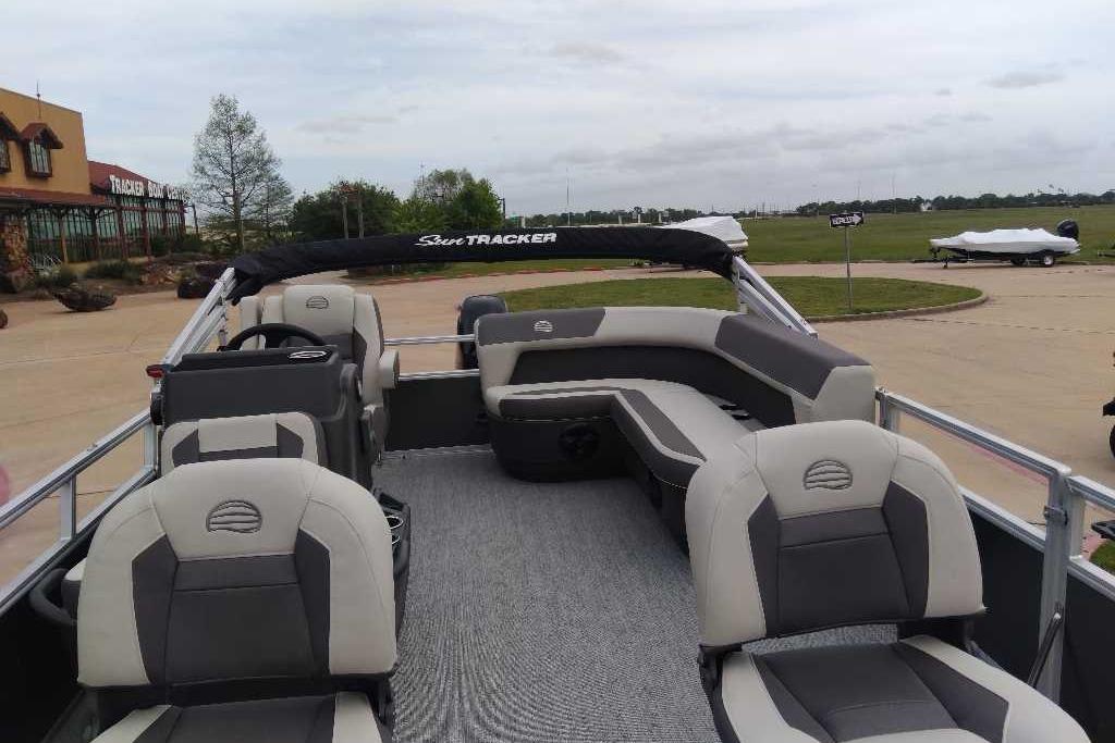 2026 Sun Tracker Bass Buggy 16 XL Select pontoon boat with spacious seating and modern design.