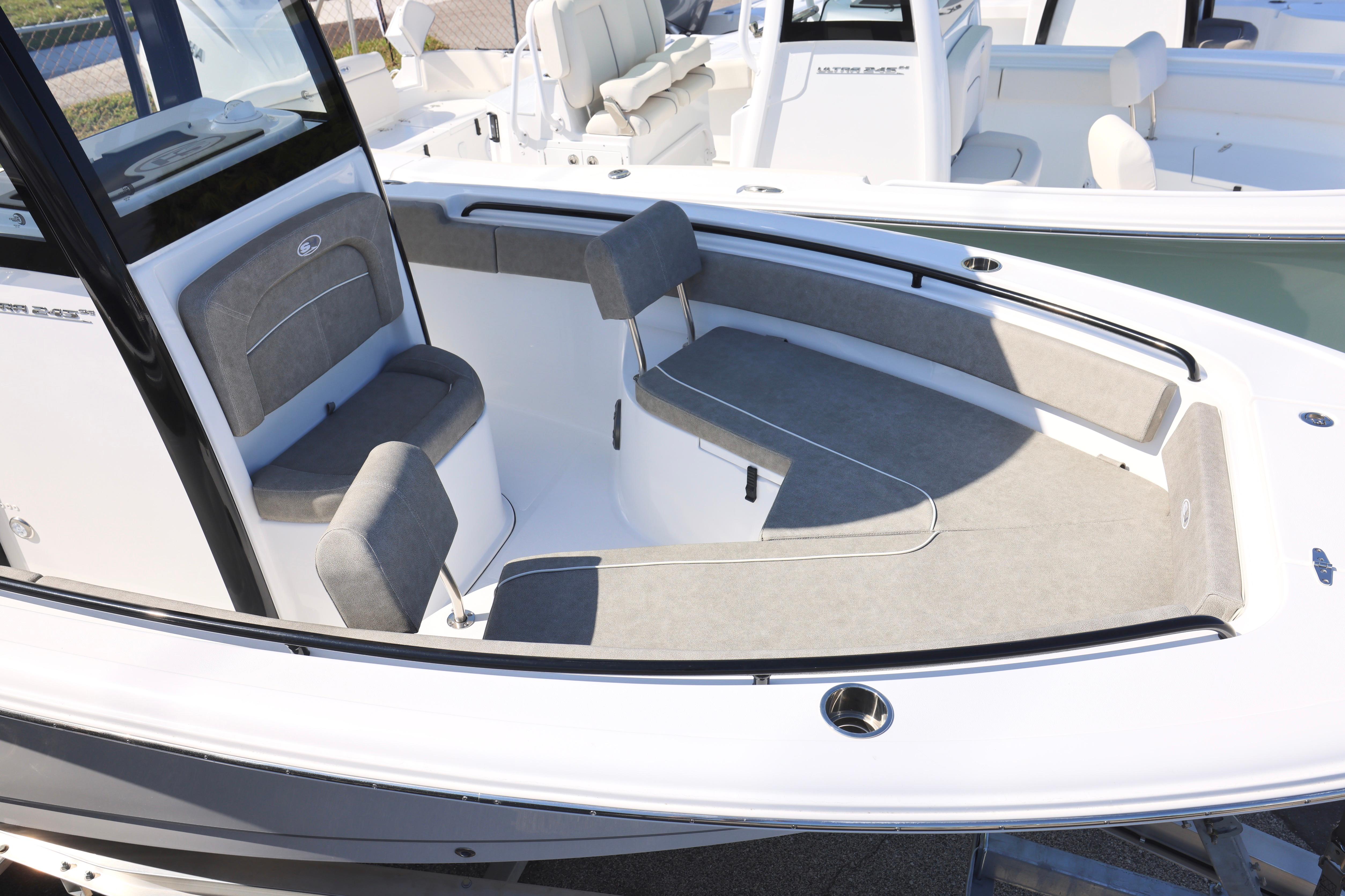 2026 Sea Hunt Ultra 245 SE boat interior with cushioned seating and sleek design.