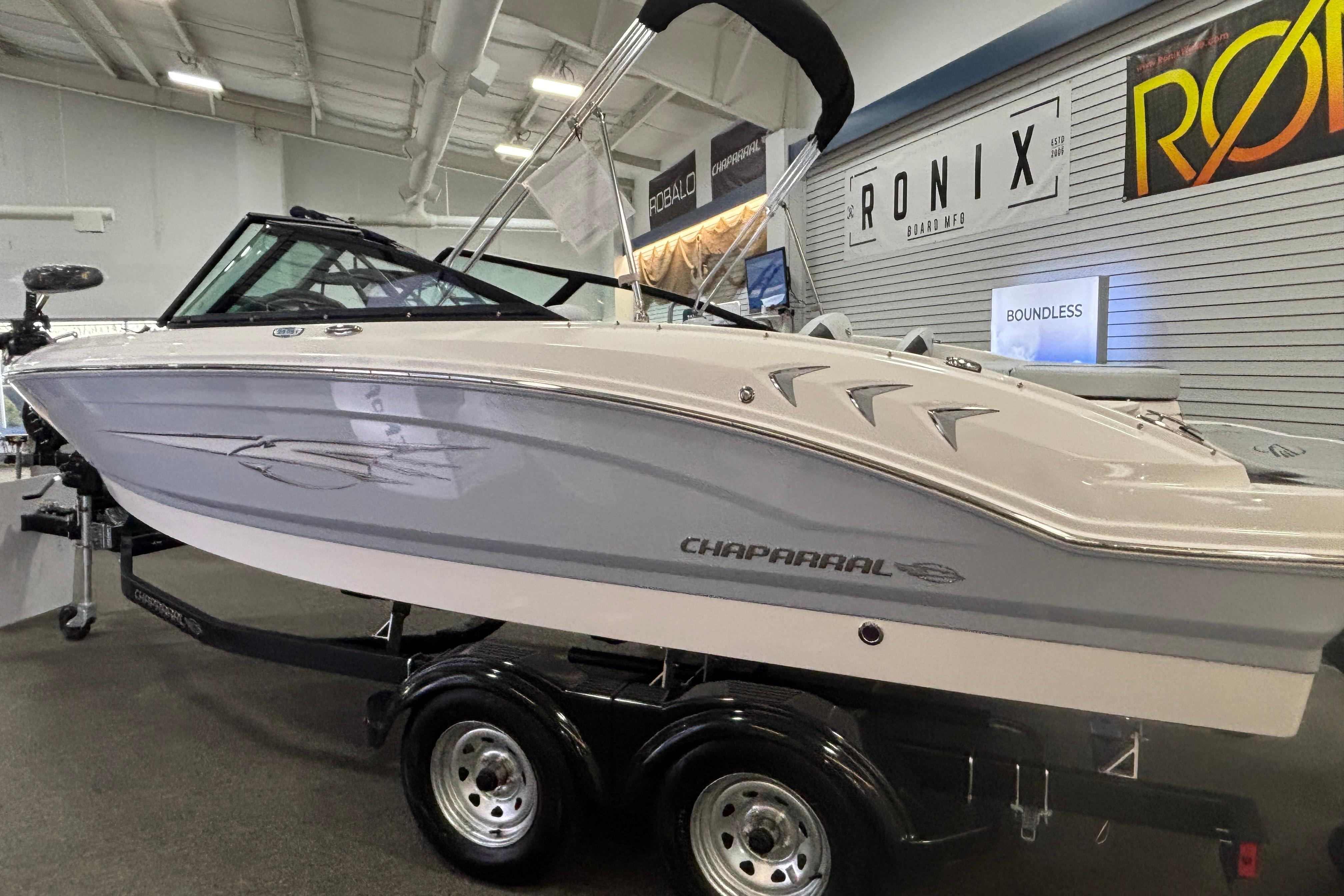 2026 Chaparral 21 SSi Ski & Fish boat in showroom.