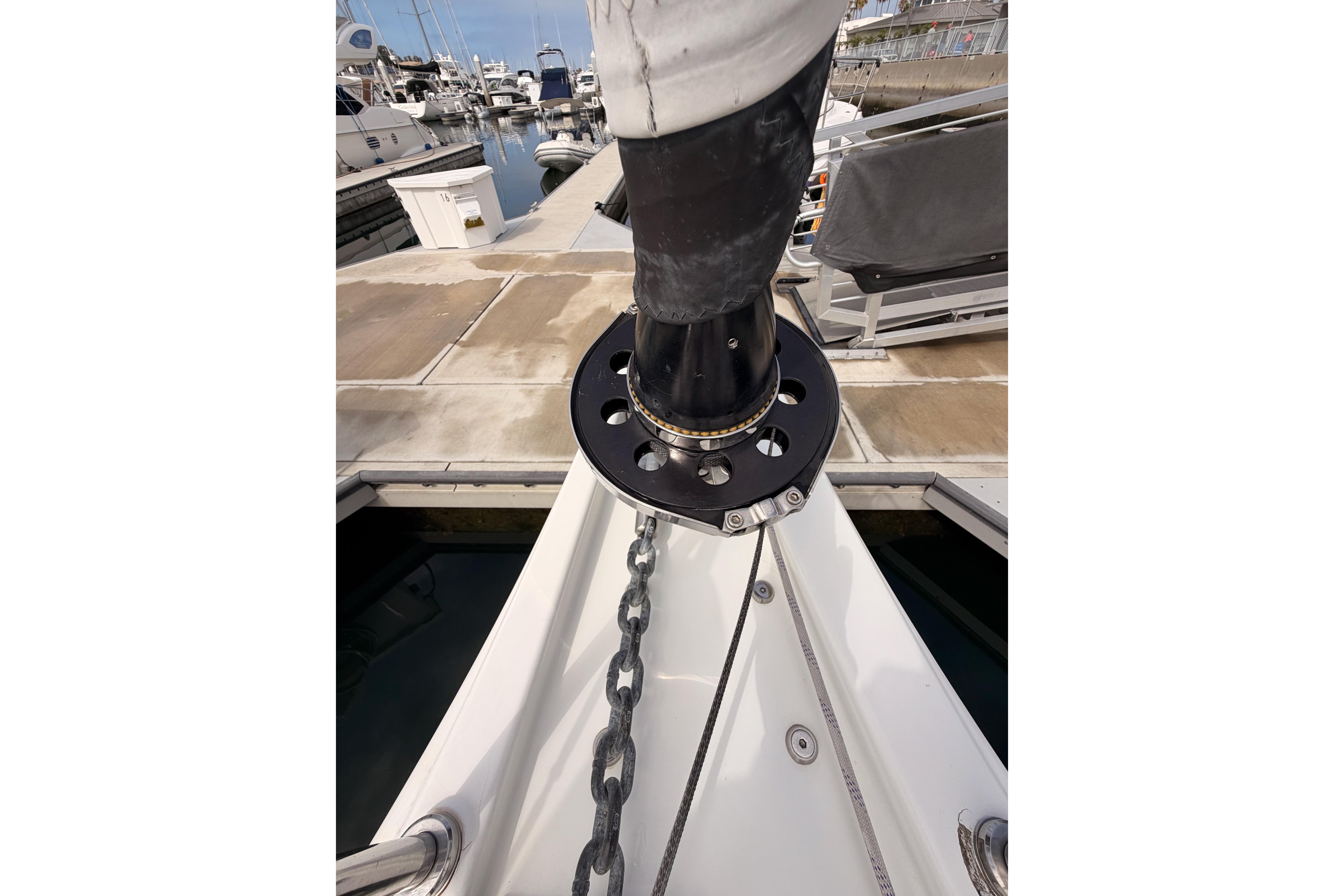 Anchor chain and deck detail of 2020 Beneteau Oceanis 46.1 at marina.