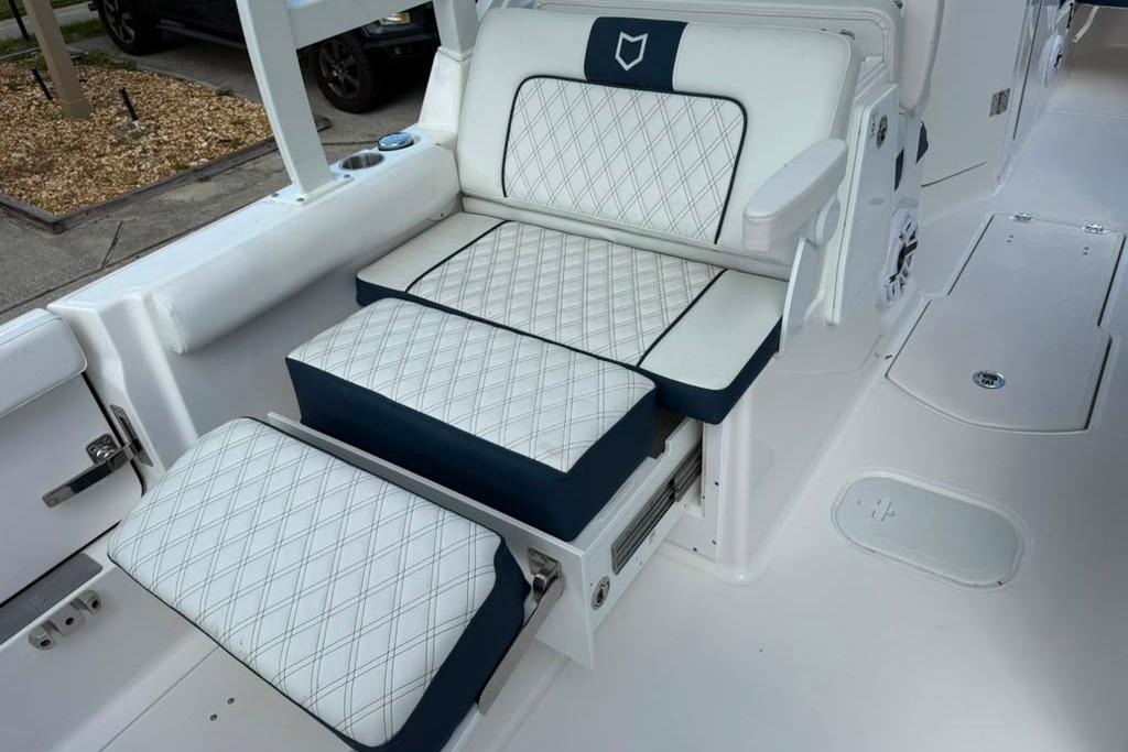 Luxurious seating on 2026 Sea Fox 288 Traveler boat with diamond-stitched upholstery.
