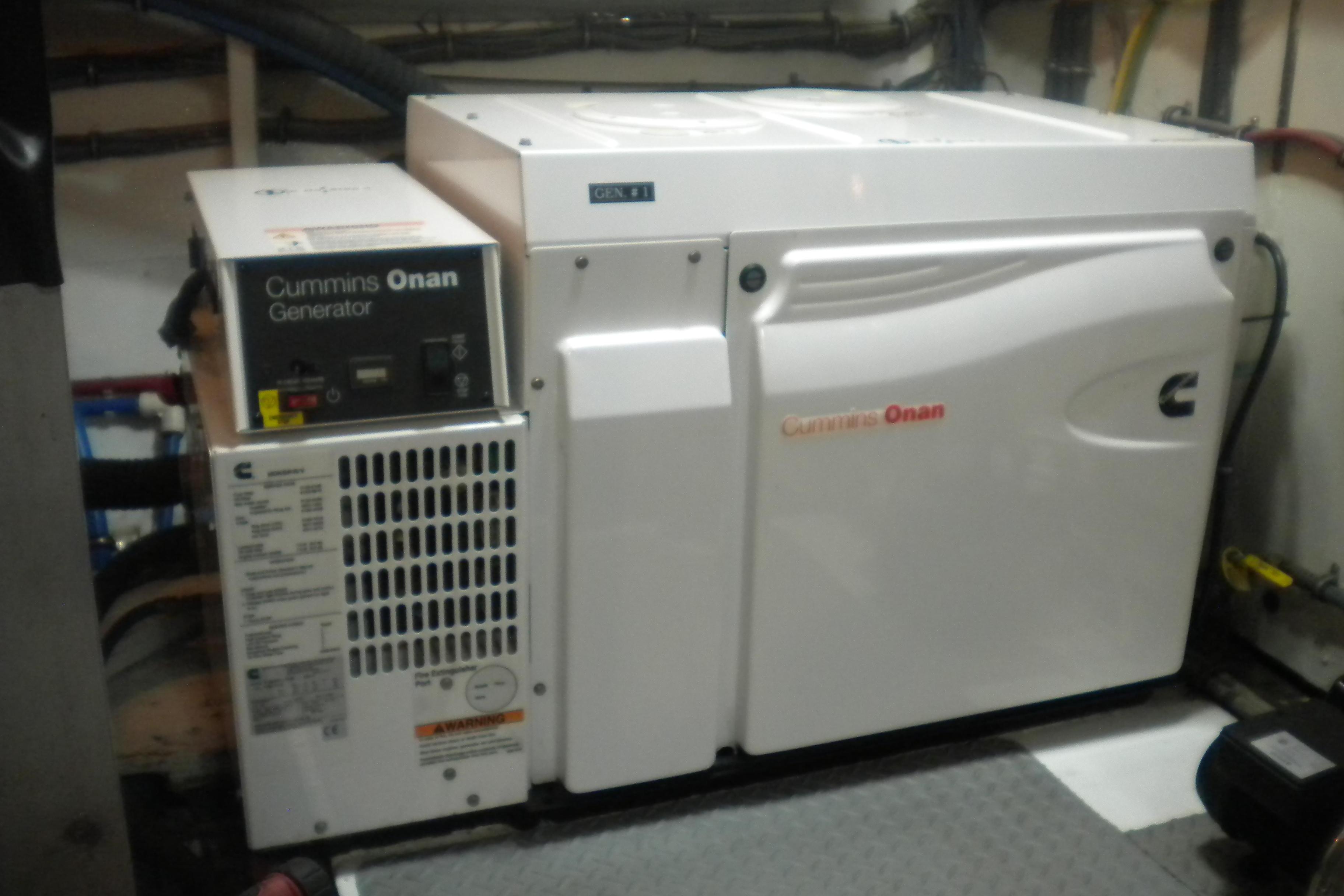 Cummins Onan generator in 1980 Hatteras 70 Motor Yacht engine room.