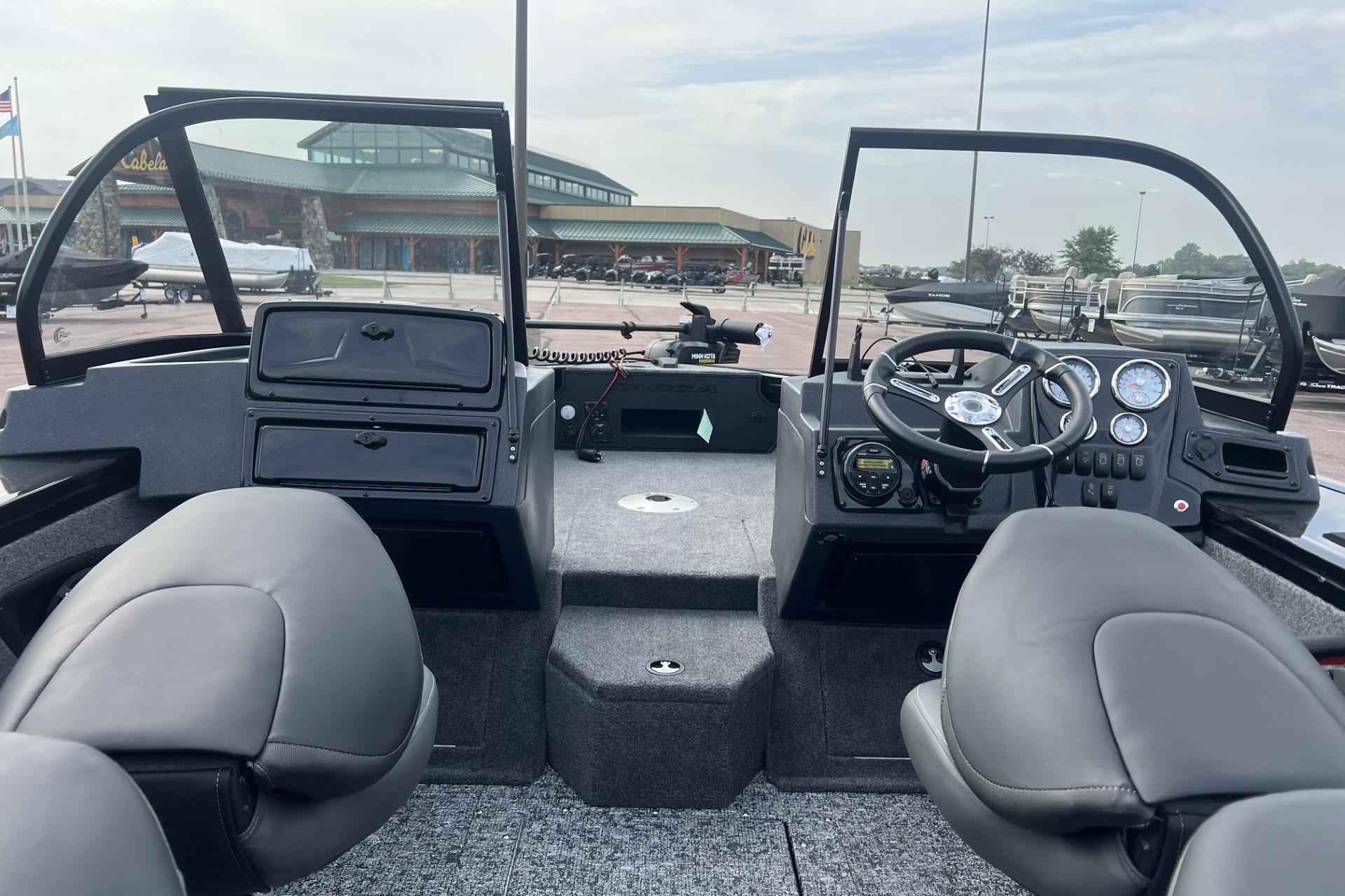 2025 Tracker Targa V-18 Combo boat interior with steering wheel and seating.