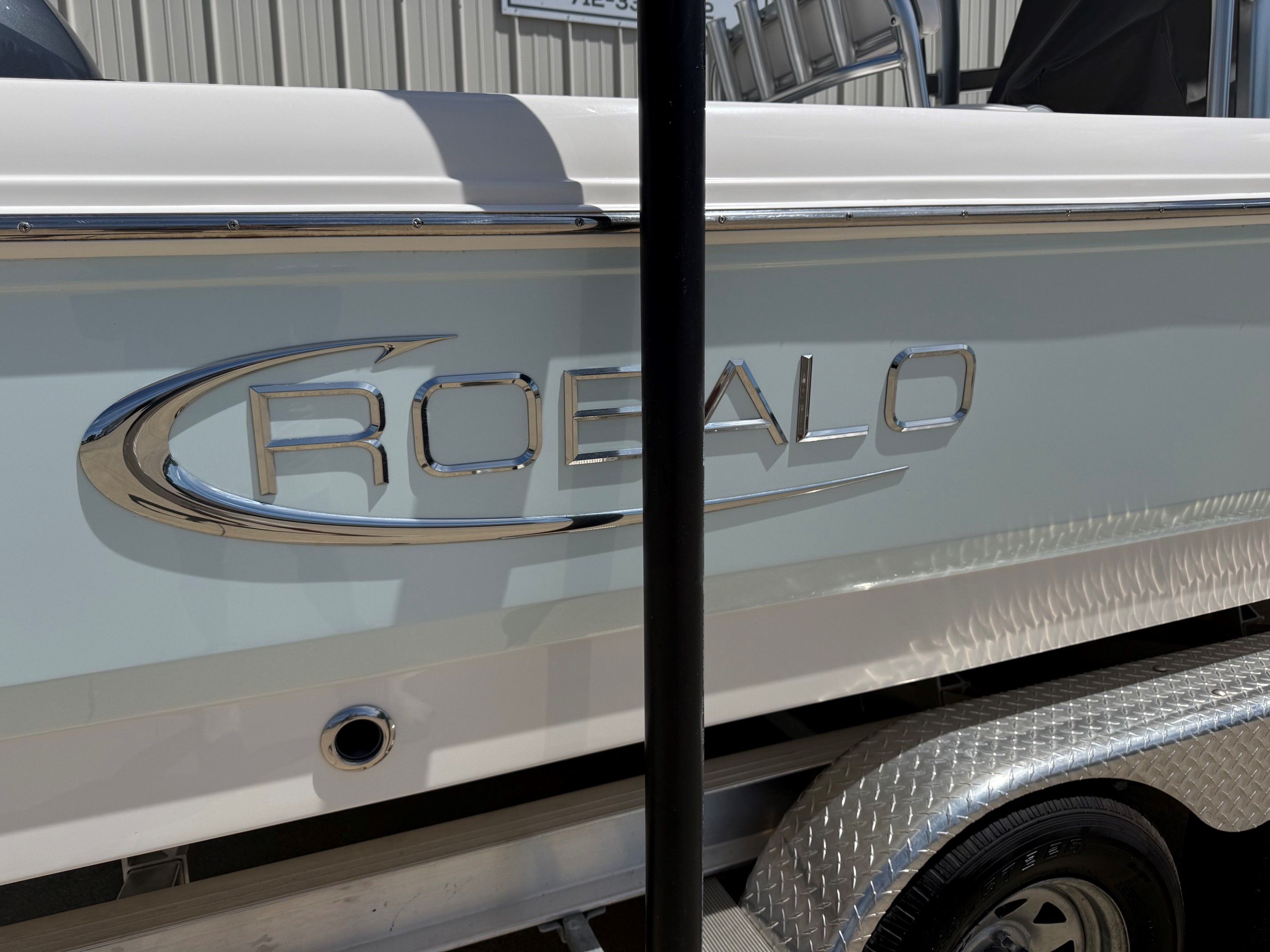 Robalo 226 Cayman boat, 2021 model, on trailer.