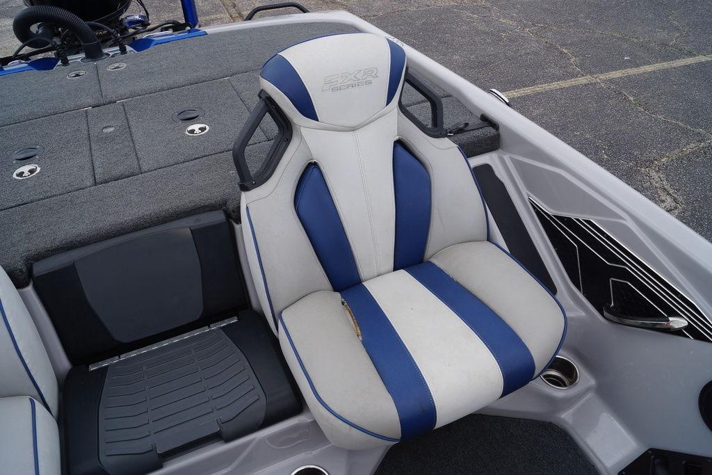 2020 Skeeter FXR21 Limited boat seat with blue and white upholstery.
