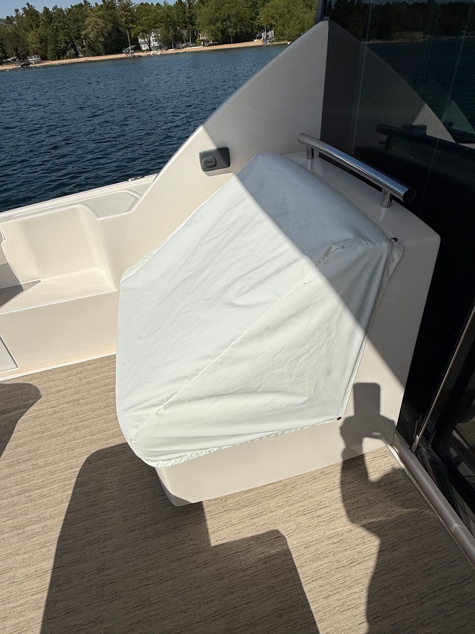 Part of the deck of a 2017 Tiara Yachts C44 Coupe with a cover.