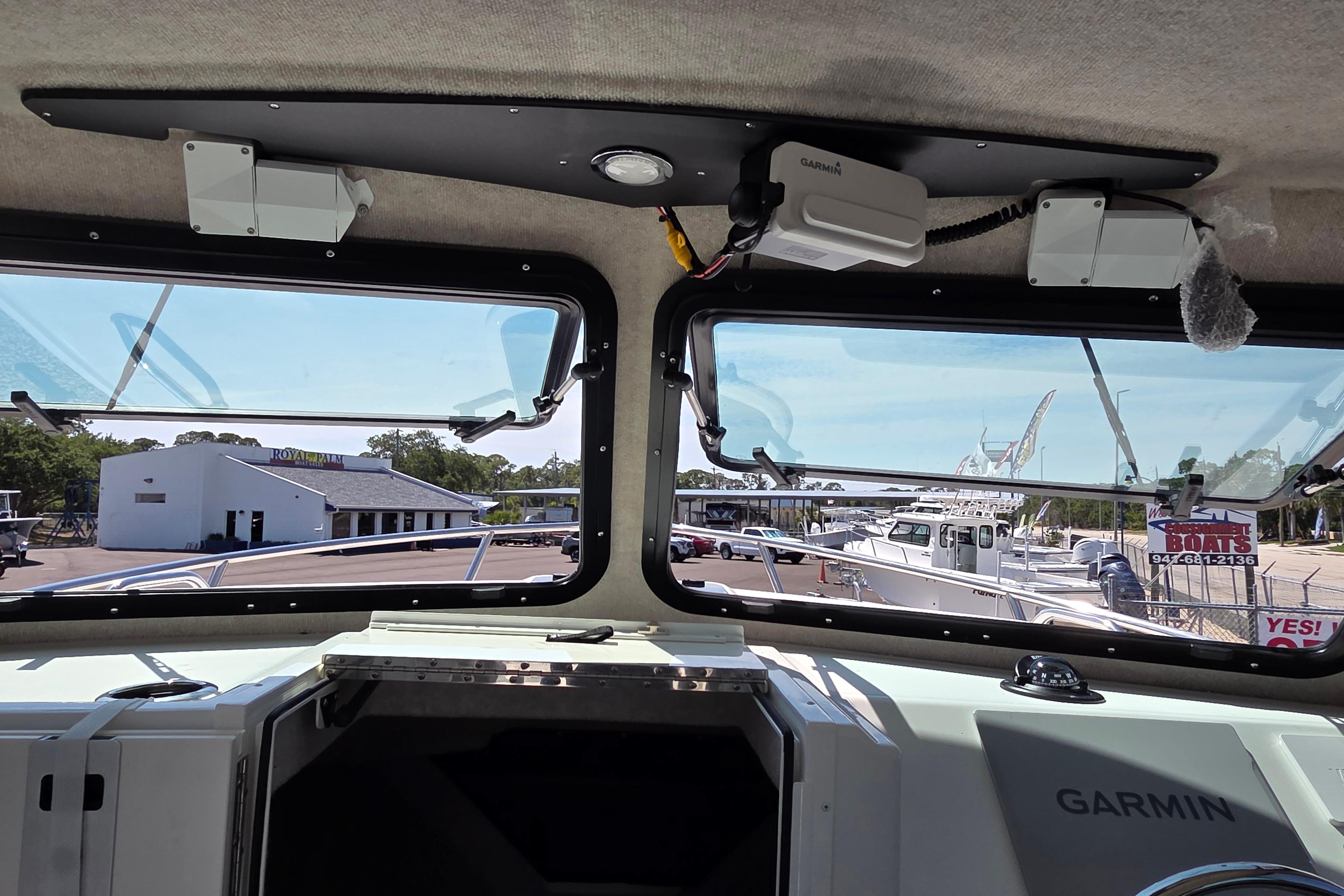 Interior view of 2026 Parker 287 Explorer boat with Garmin equipment.