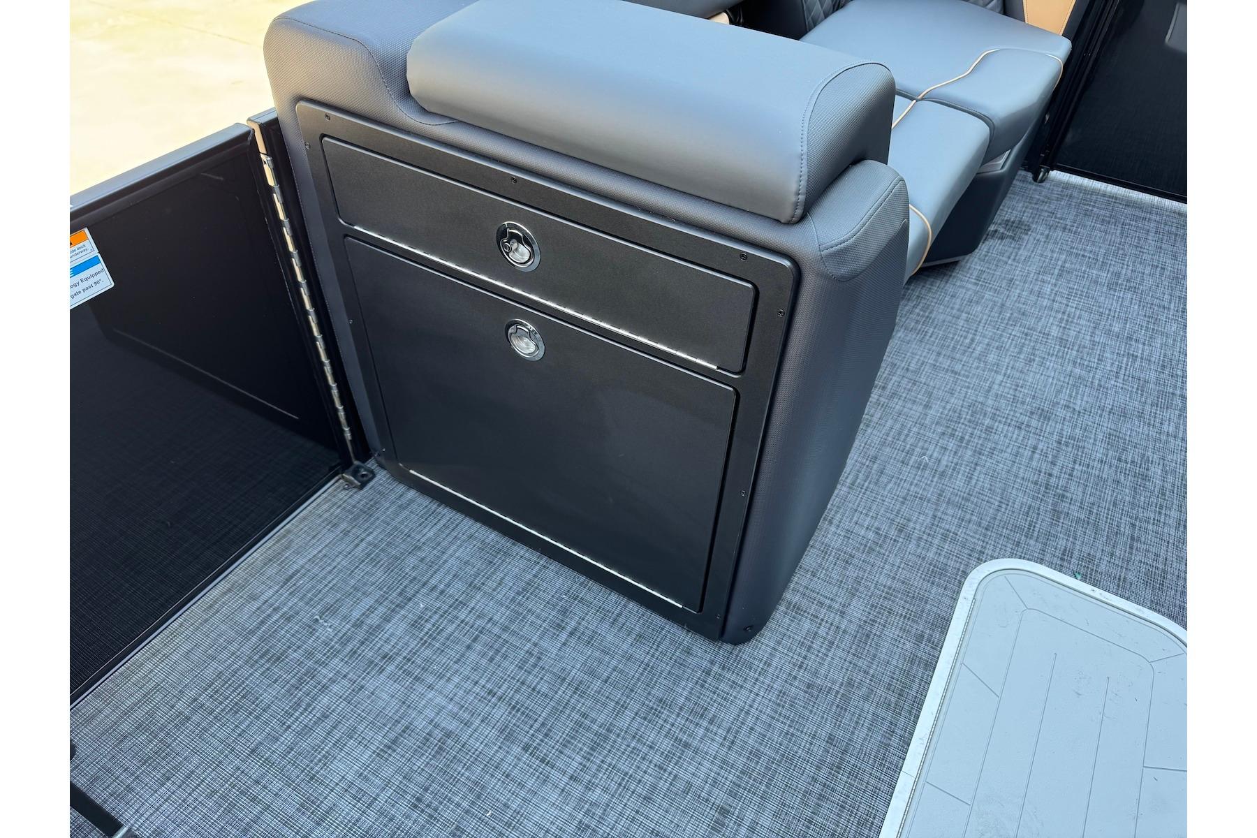 2026 Godfrey SWEETWATER 2286 SFL boat interior with sleek seating and storage.