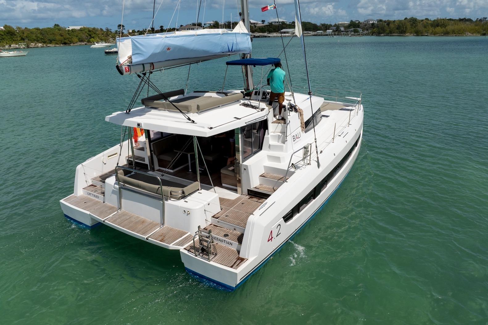 Modern Bali 4.2 catamaran sailing in clear waters, 2022 model.