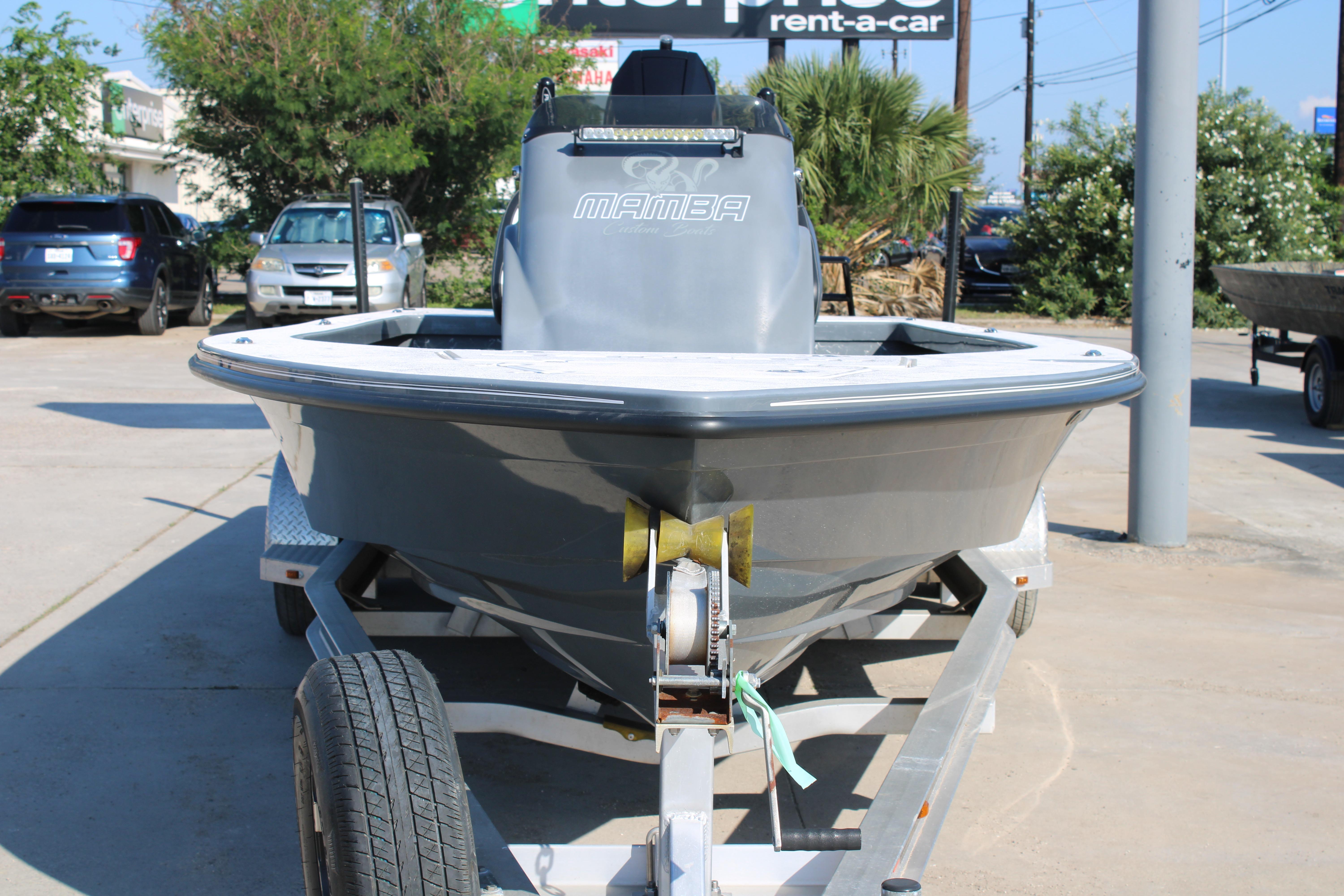 2023 Mamba 24VX boat on trailer in outdoor setting.