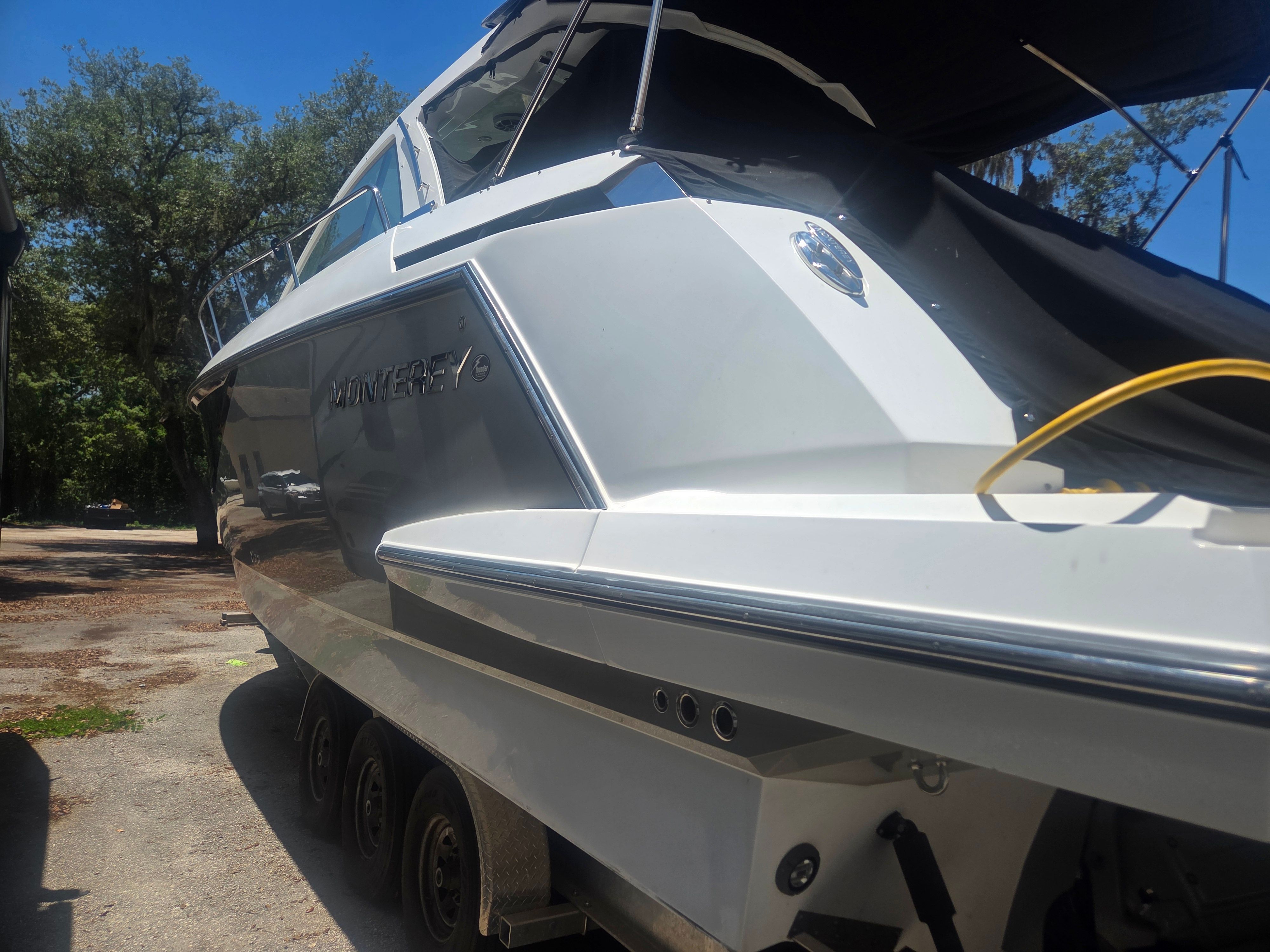 2019 Monterey 360SC boat on a trailer outdoors.