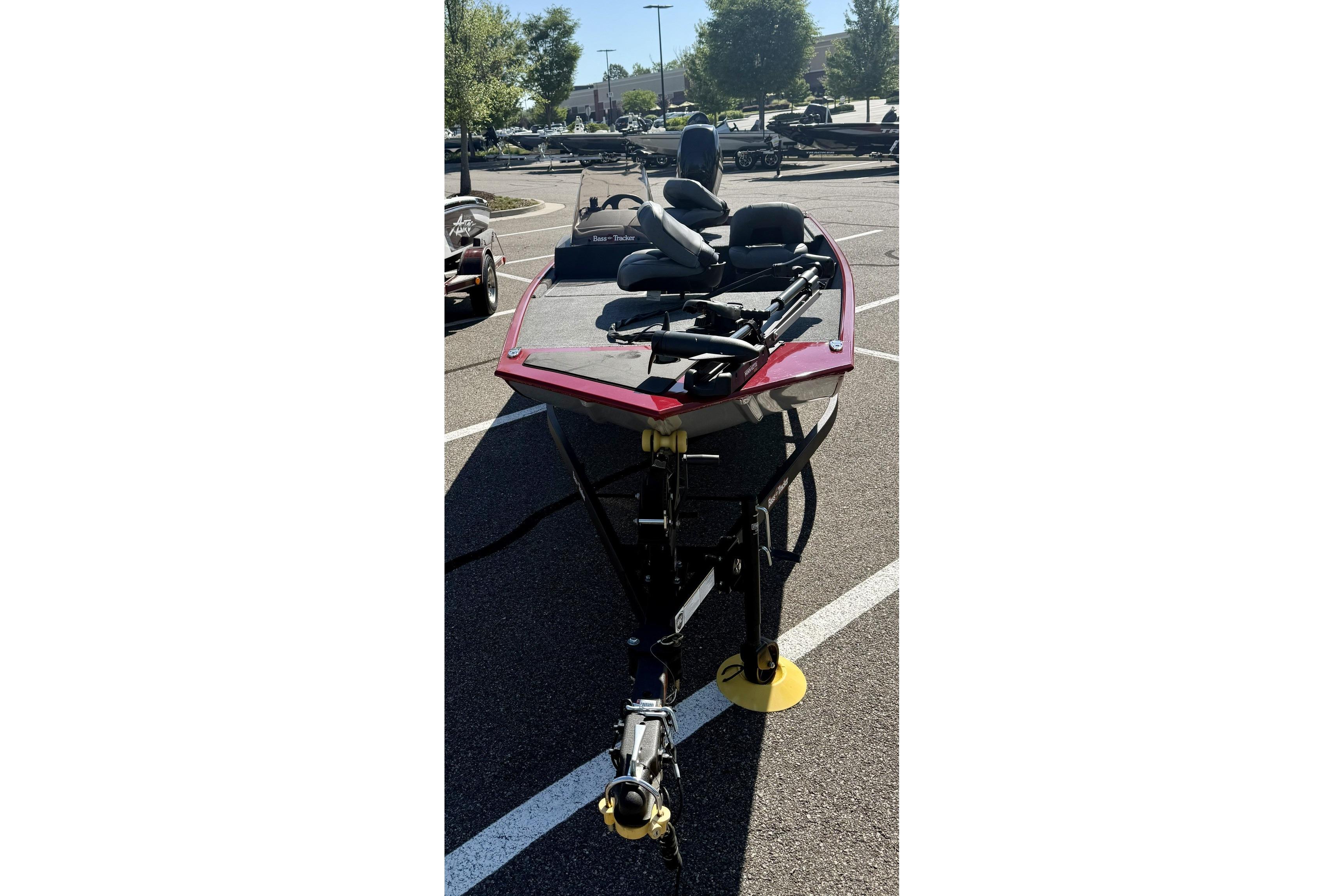 2023 Tracker Bass Tracker Classic XL boat in a parking lot, front view.