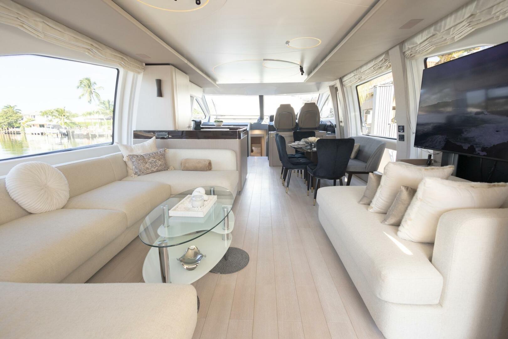 Luxurious interior of 2021 Azimut Fly 72 yacht with elegant seating and modern decor.