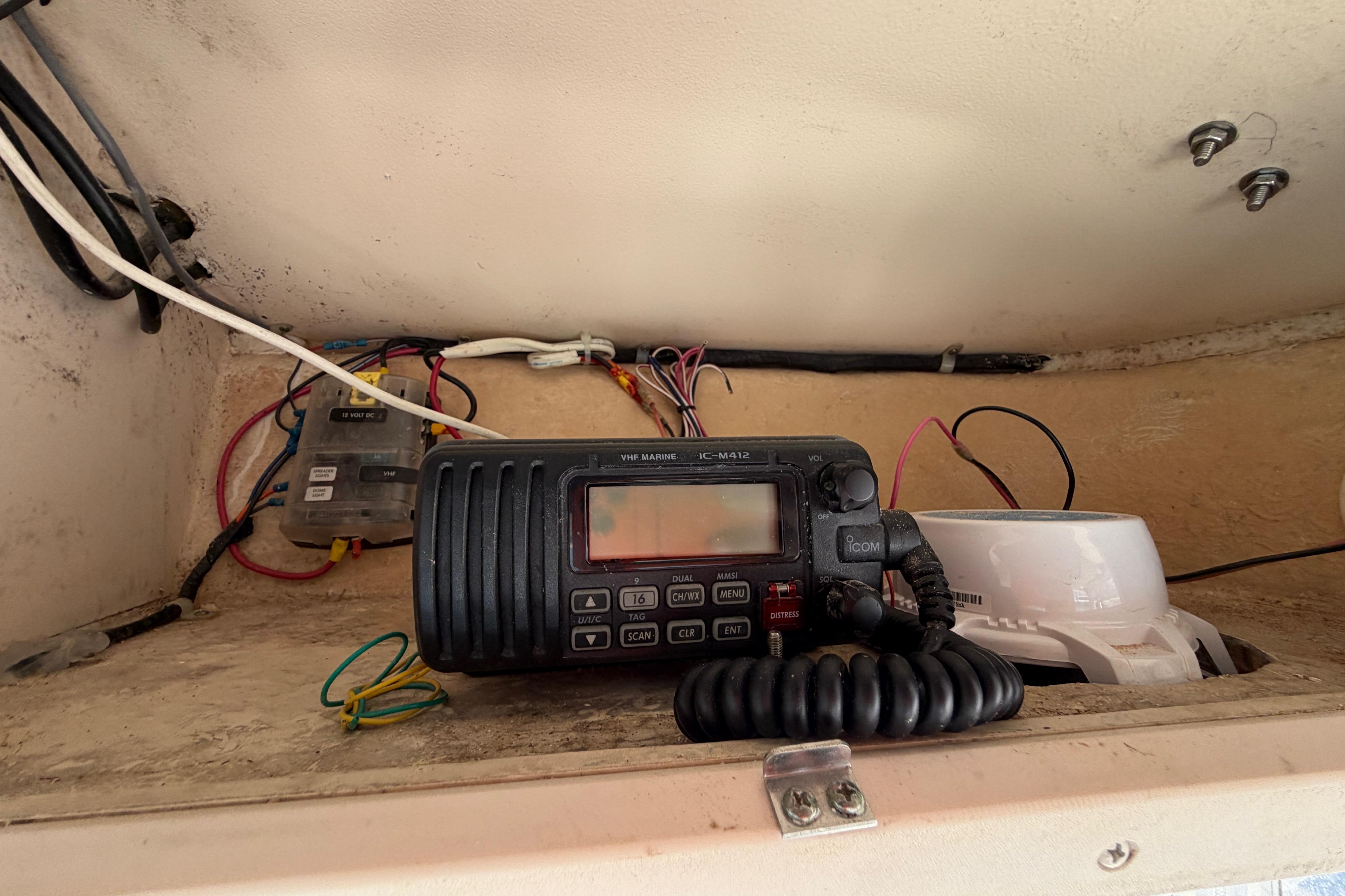 VHF marine radio and wiring inside a 2006 Grady-White Sailfish 282 boat.