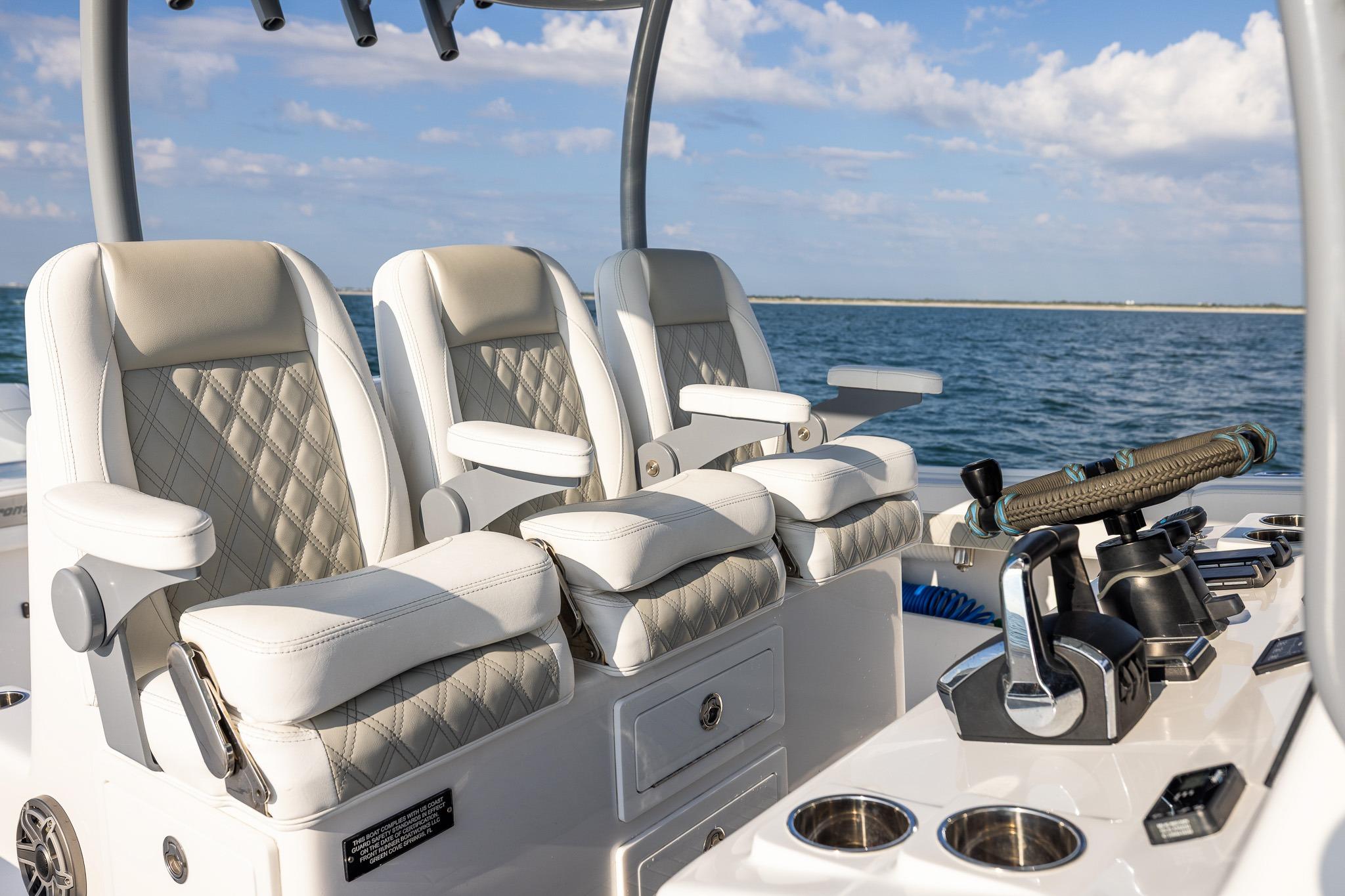Luxurious seating on 2026 Front Runner 37 Catamaran, featuring elegant design and ocean backdrop.