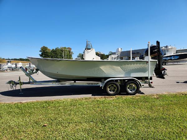 2023 May-Craft 208 CC boat on trailer in sunny outdoor setting.