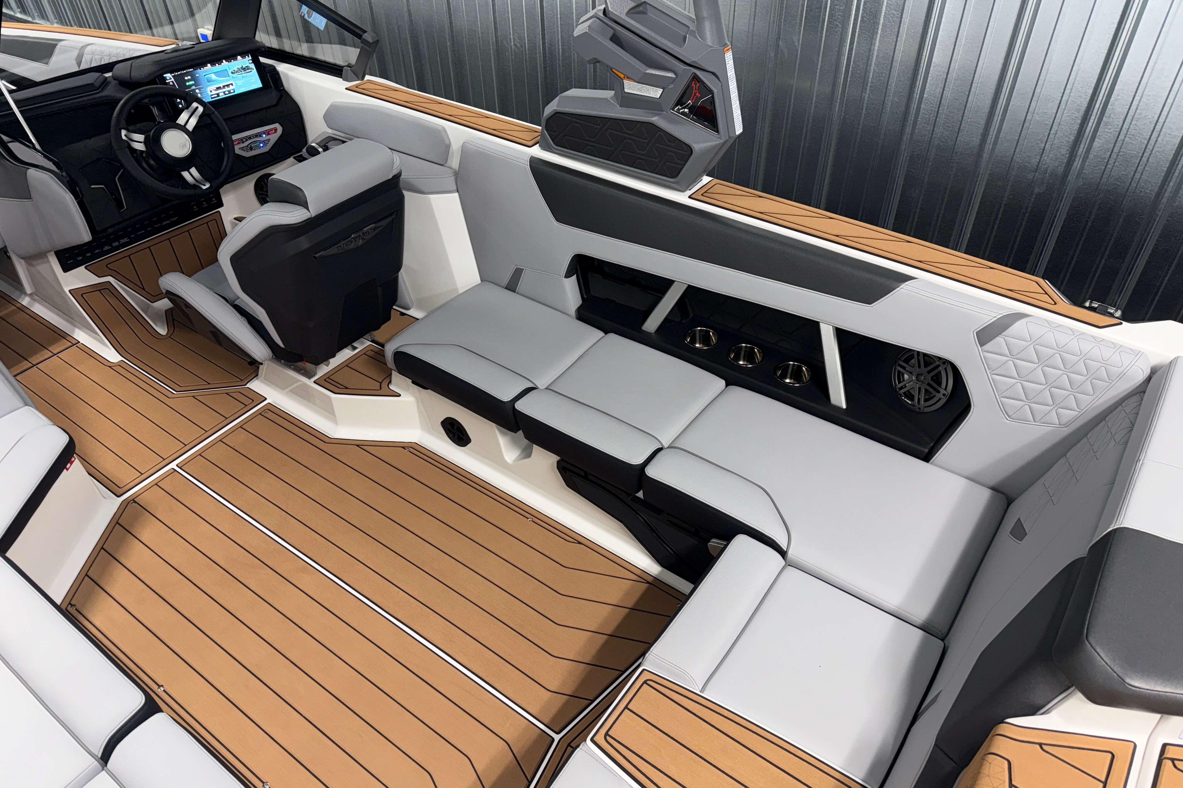 2026 Nautique Super Air Nautique GS22 interior with sleek seating and modern dashboard.