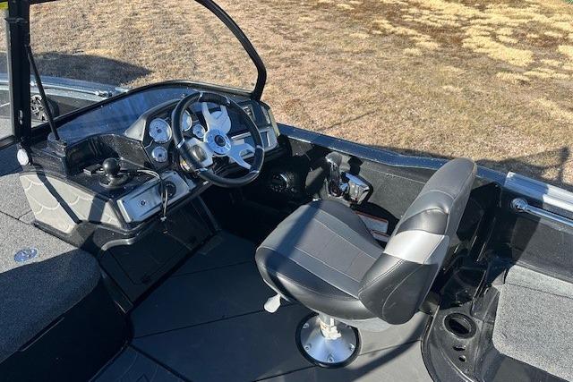 Interior of 2026 Nitro ZV20 Pro boat with steering wheel and seat.