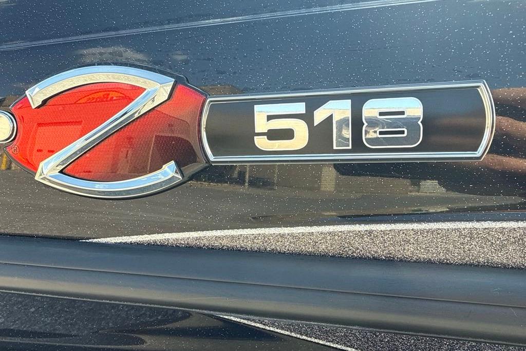 2026 Ranger Z518 emblem on a sleek, metallic surface.