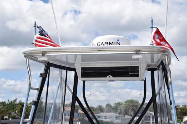 Hardtop with burgee masts and three side enclosure
