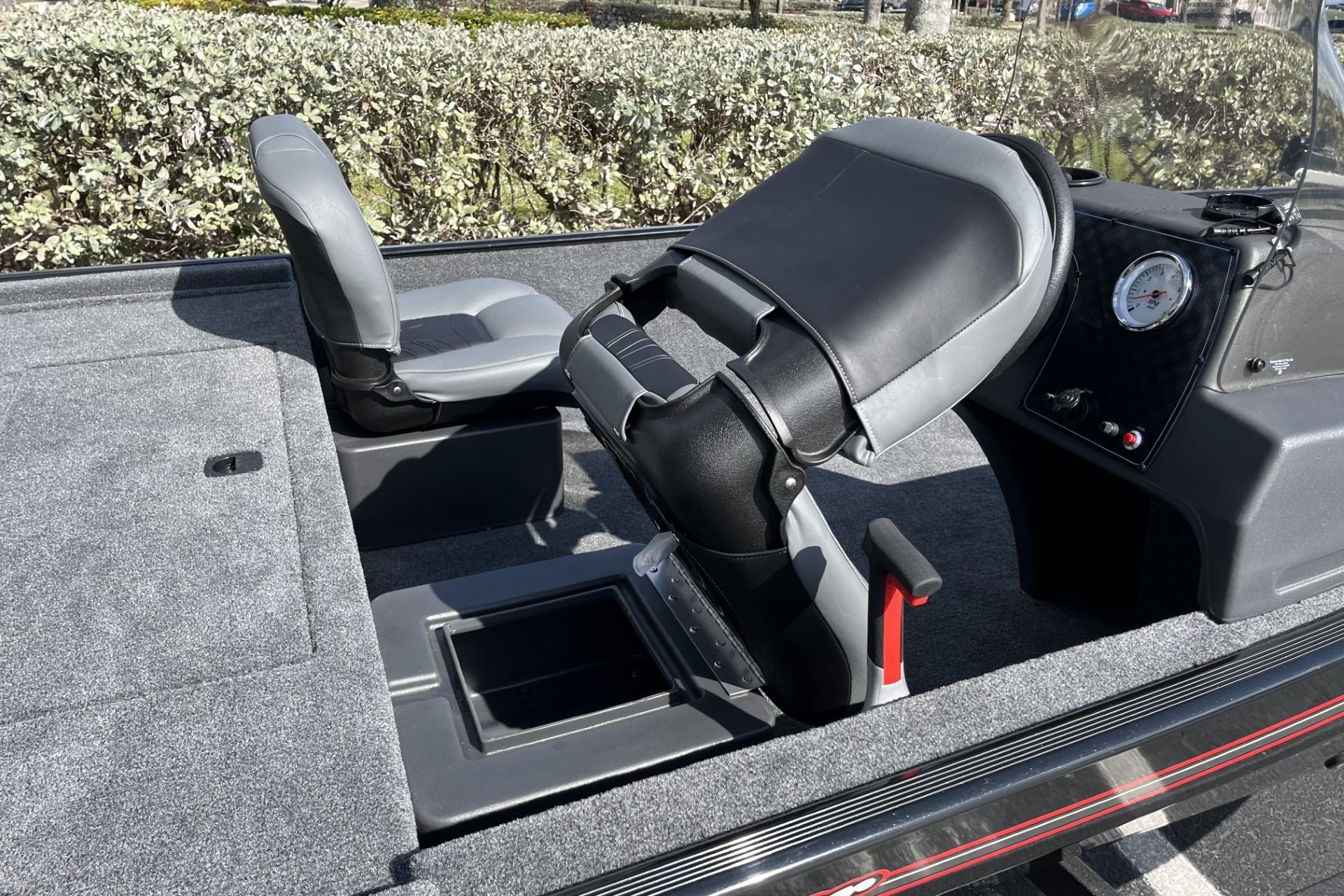 2026 Tracker Bass Tracker Classic XL boat interior with seating and dashboard.