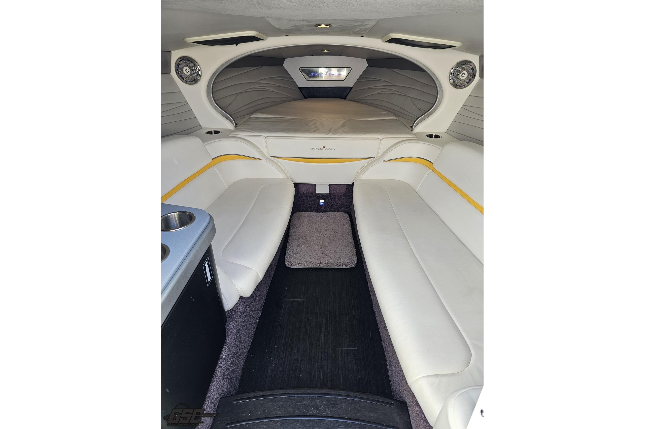 2014 Formula 292 FASTech cabin interior with white seating and modern design.