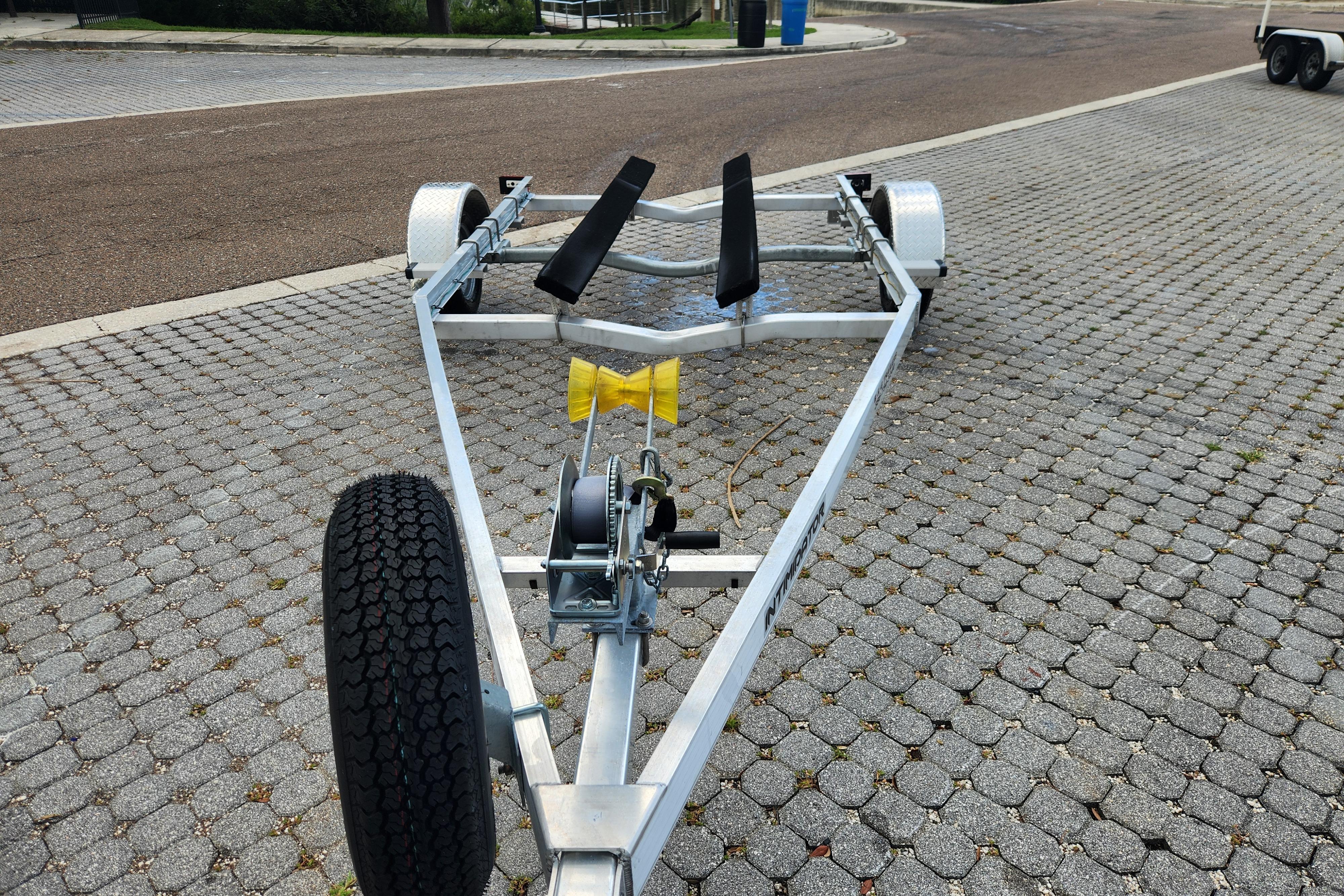 2019 Novurania DL 400 boat trailer on paved surface, featuring sturdy frame and wheels.