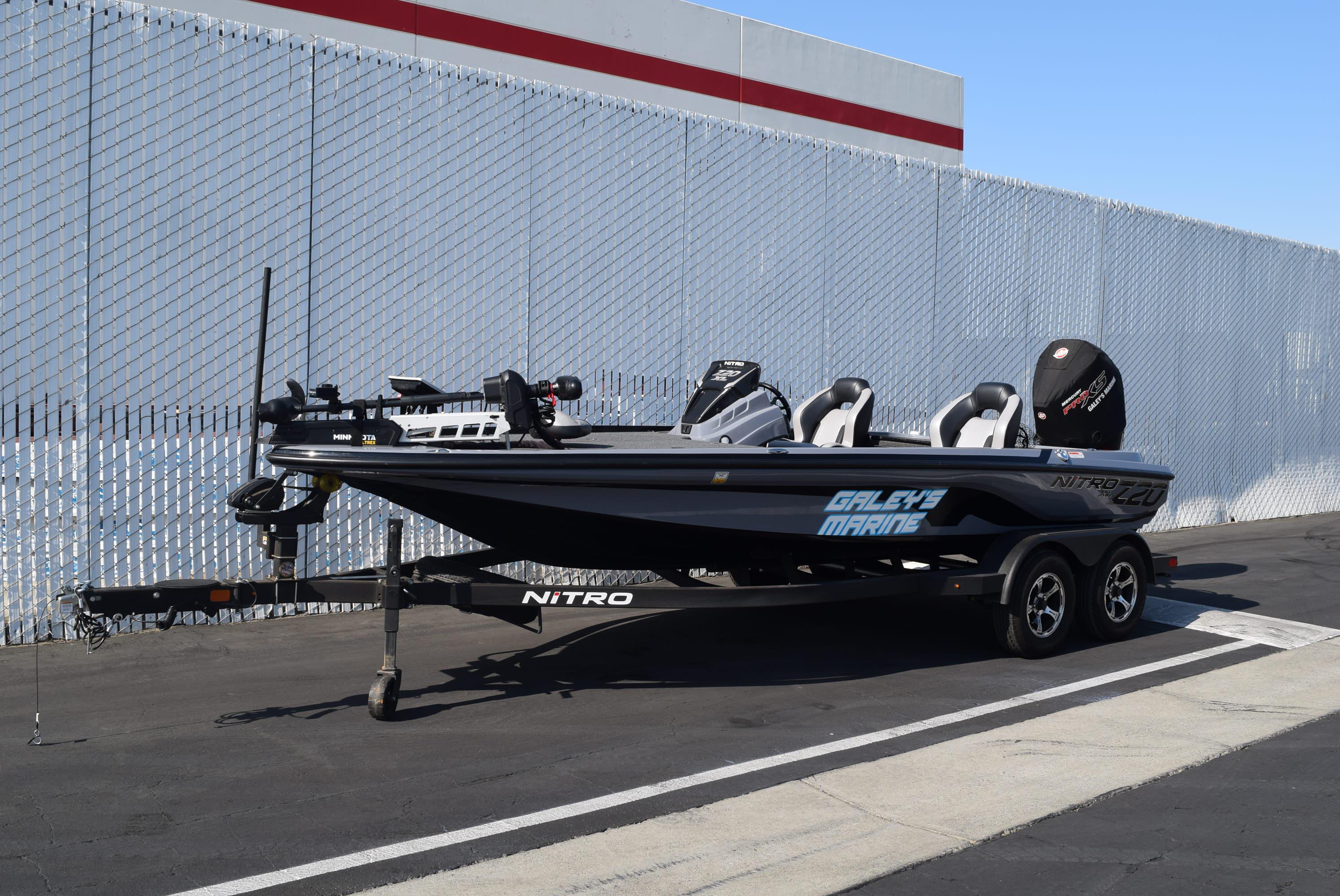 2025 Nitro Z20 XL Pro boat parked on trailer, side view.