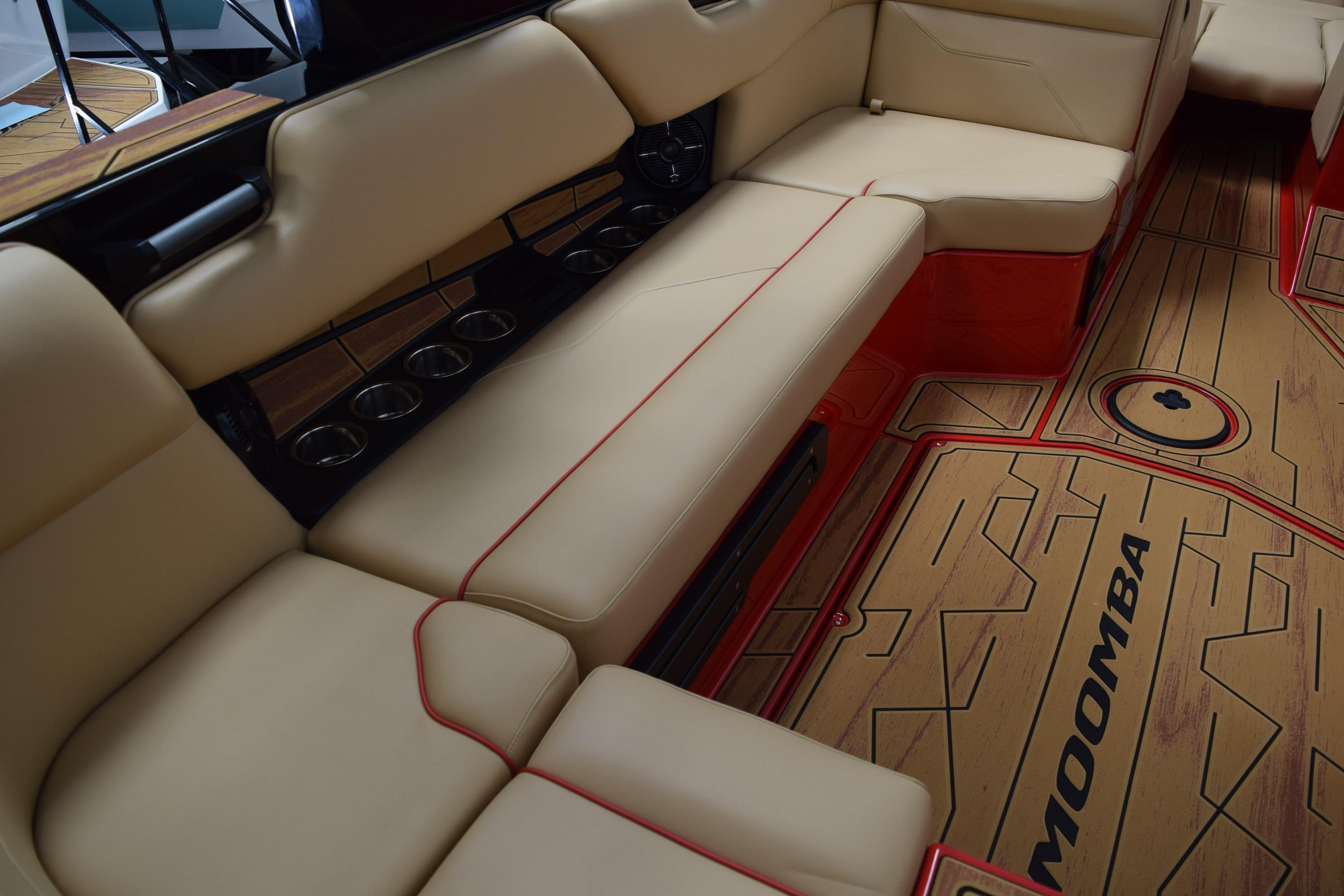 Luxurious interior of 2026 Moomba Max boat with beige seating and stylish flooring.