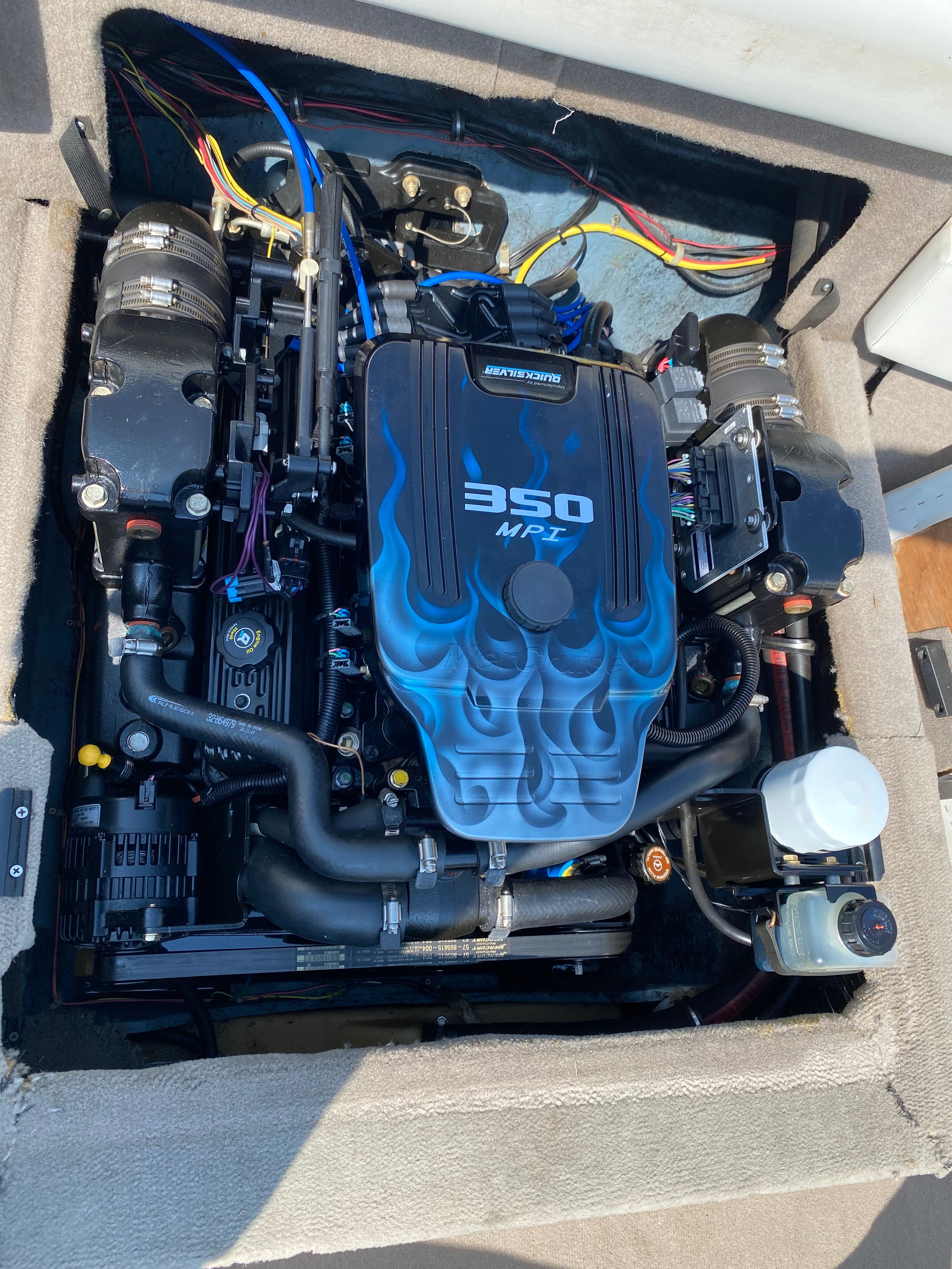 Engine compartment of a 2003 Bayliner 2152 featuring a 350 MPZ engine.