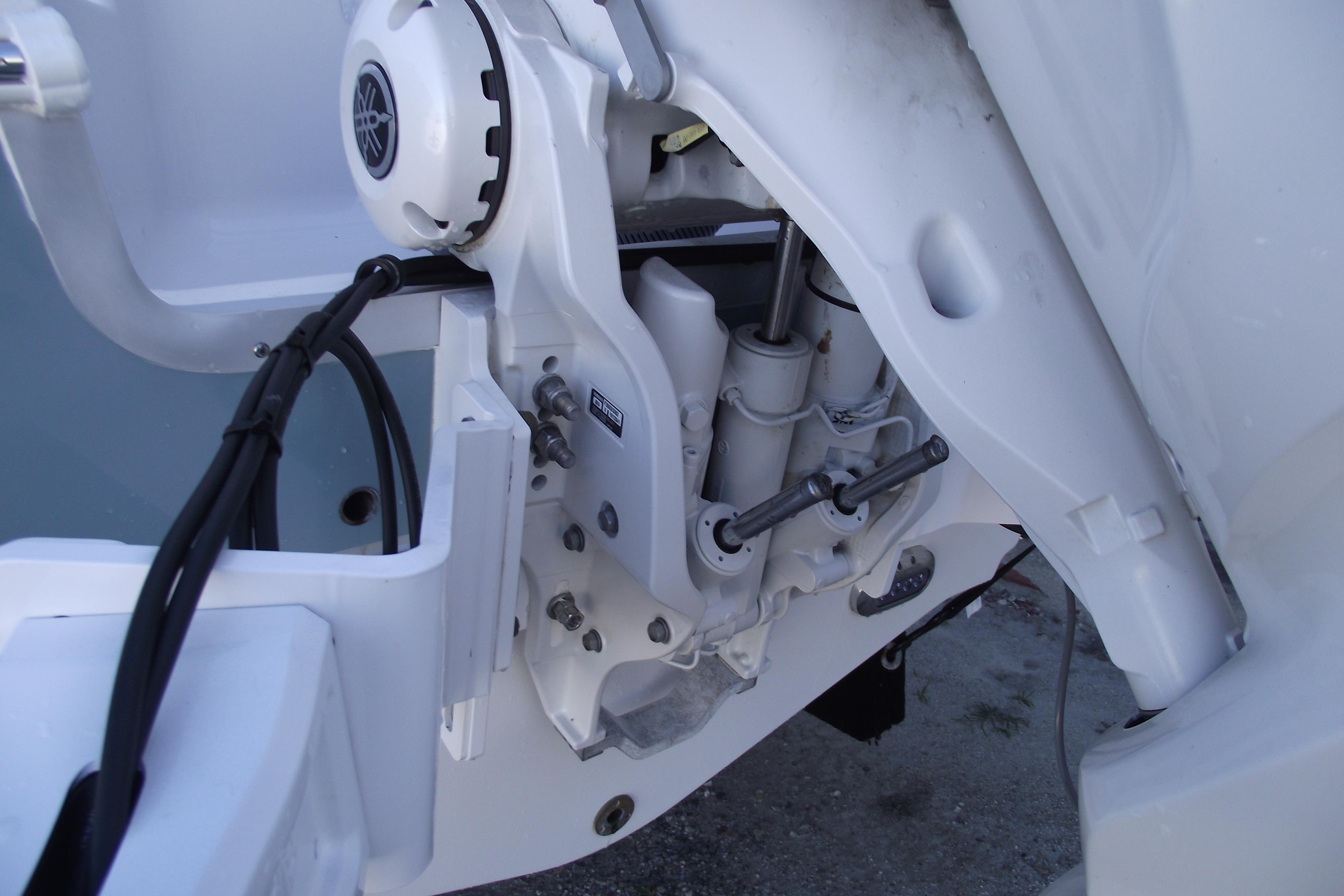 Close-up of 2023 Sea Hunt Ultra 255 SE boat engine components.