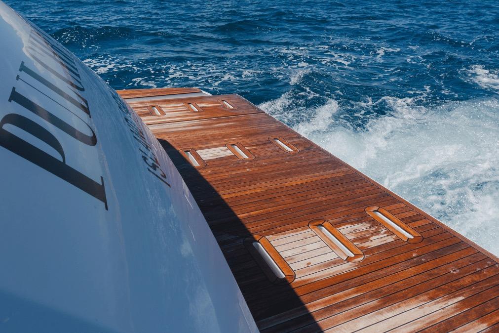 Luxury Azimut 60 yacht deck with ocean waves, 2020 model.