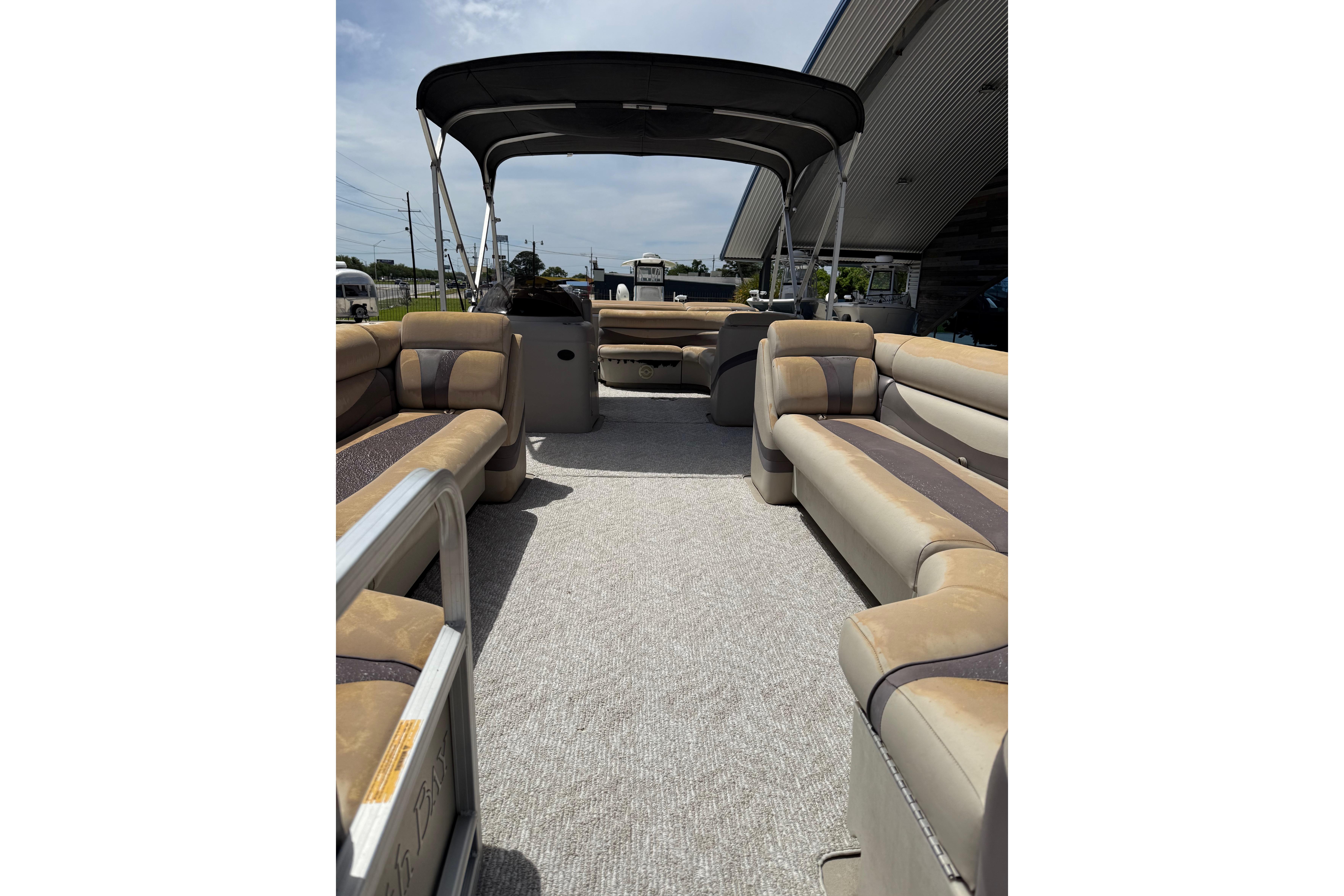 2012 South Bay 522 CR pontoon boat interior with spacious seating and canopy.