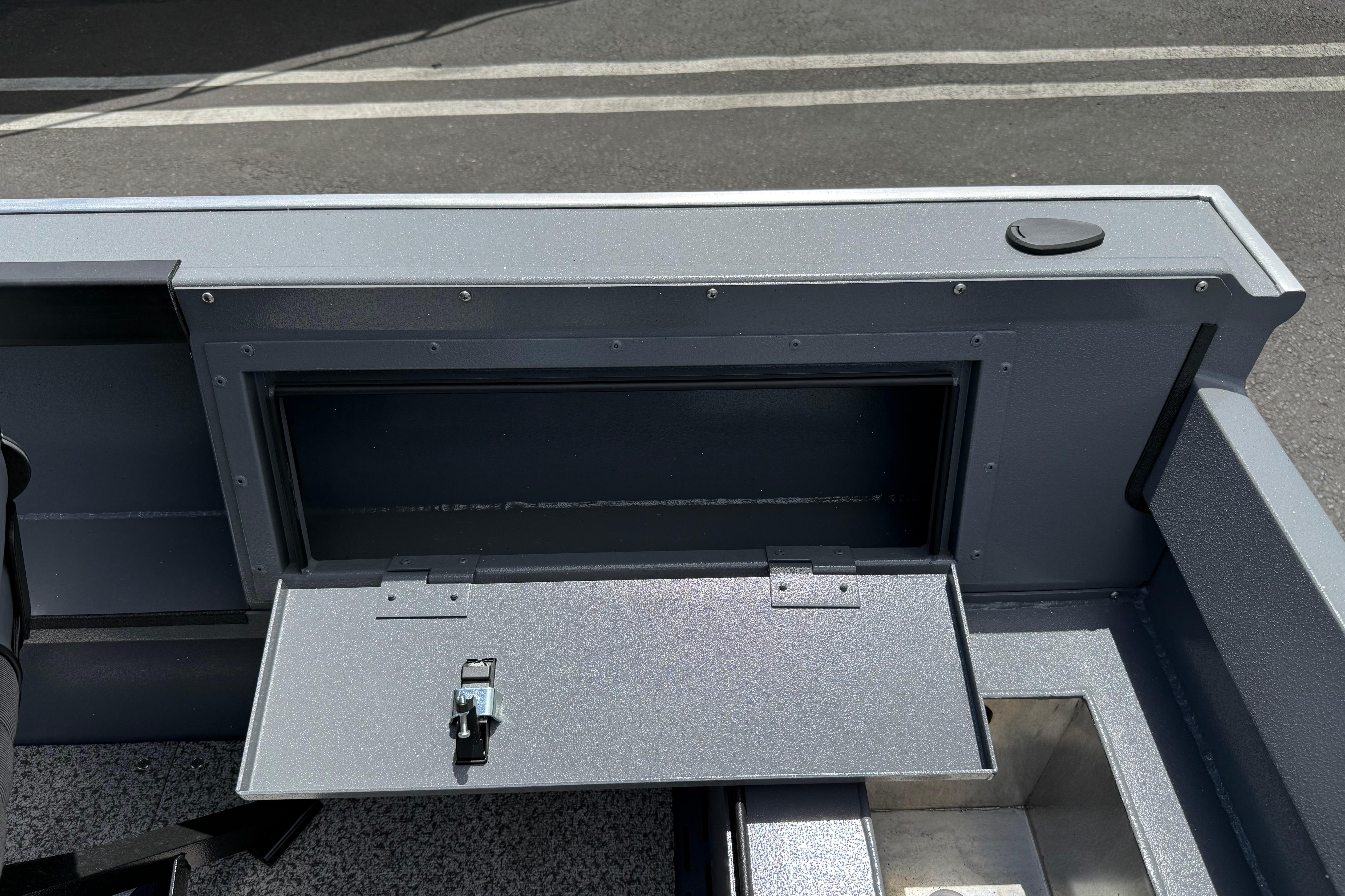 2026 Alumaweld Free Drifter 20 boat storage compartment with open hatch, showcasing interior space.