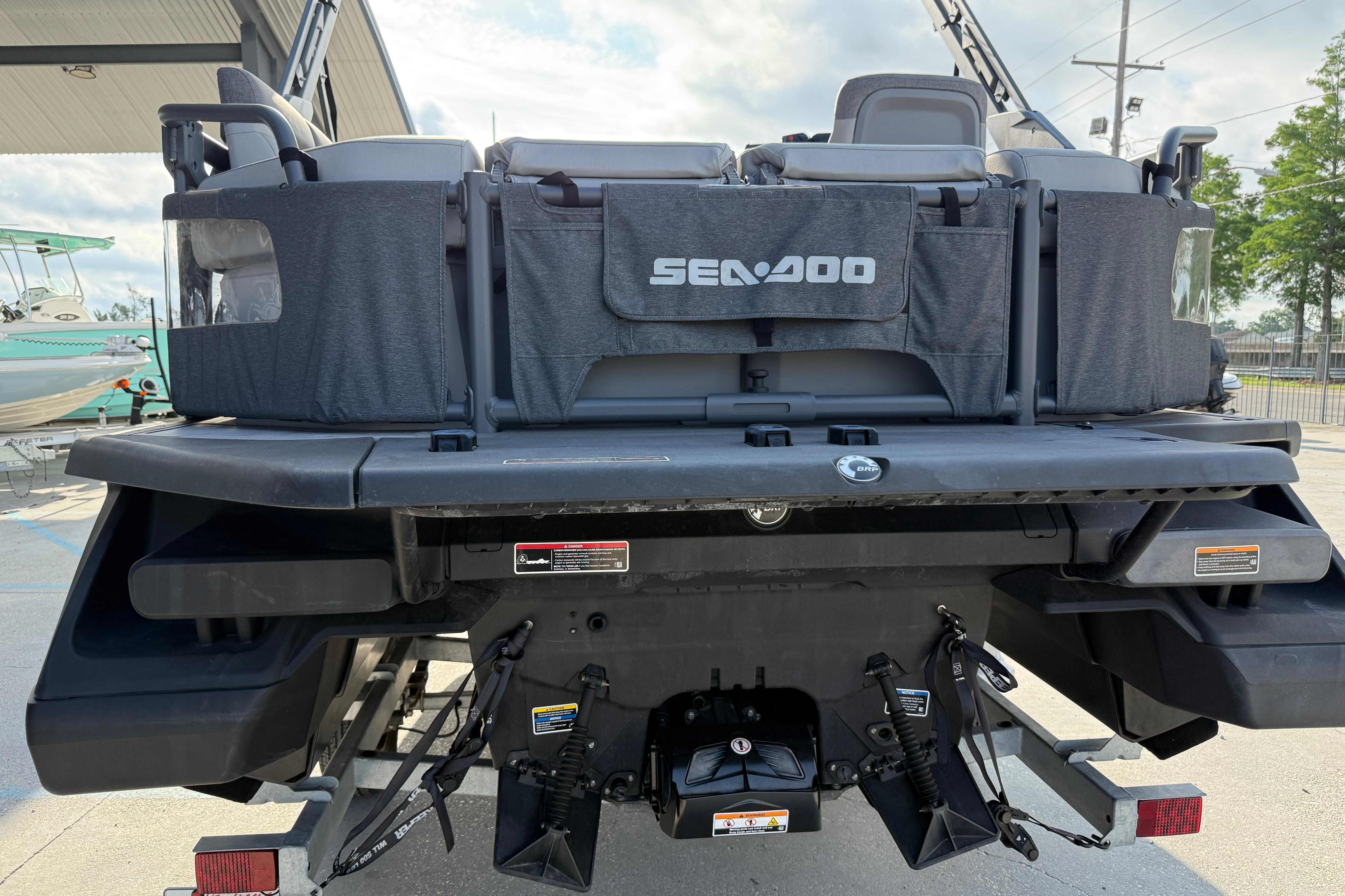 2023 Sea-Doo Switch Sport 18 rear view, showcasing seating and design features.