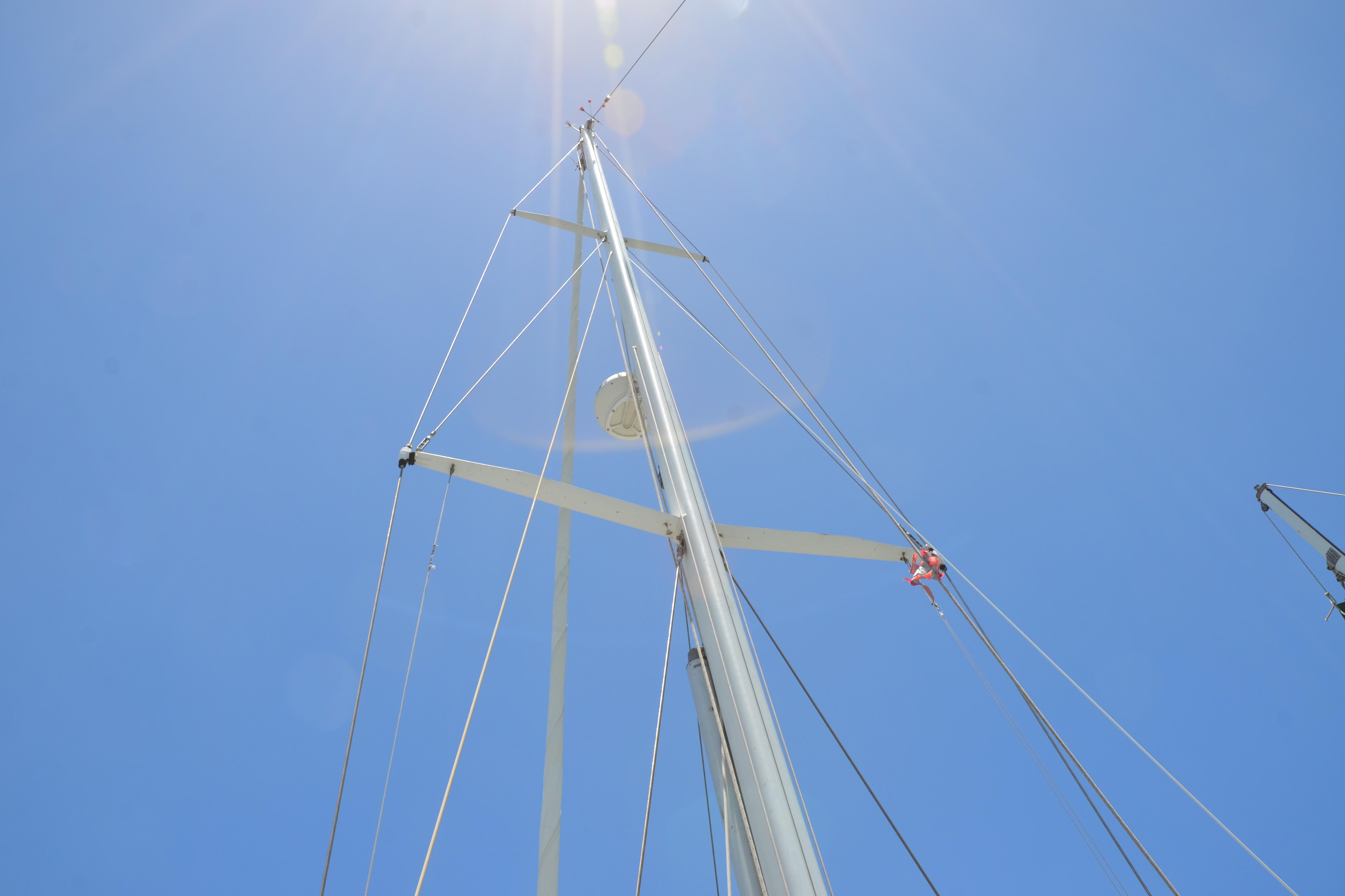 Sailboat mast of 1987 Norseman 400 against clear blue sky.