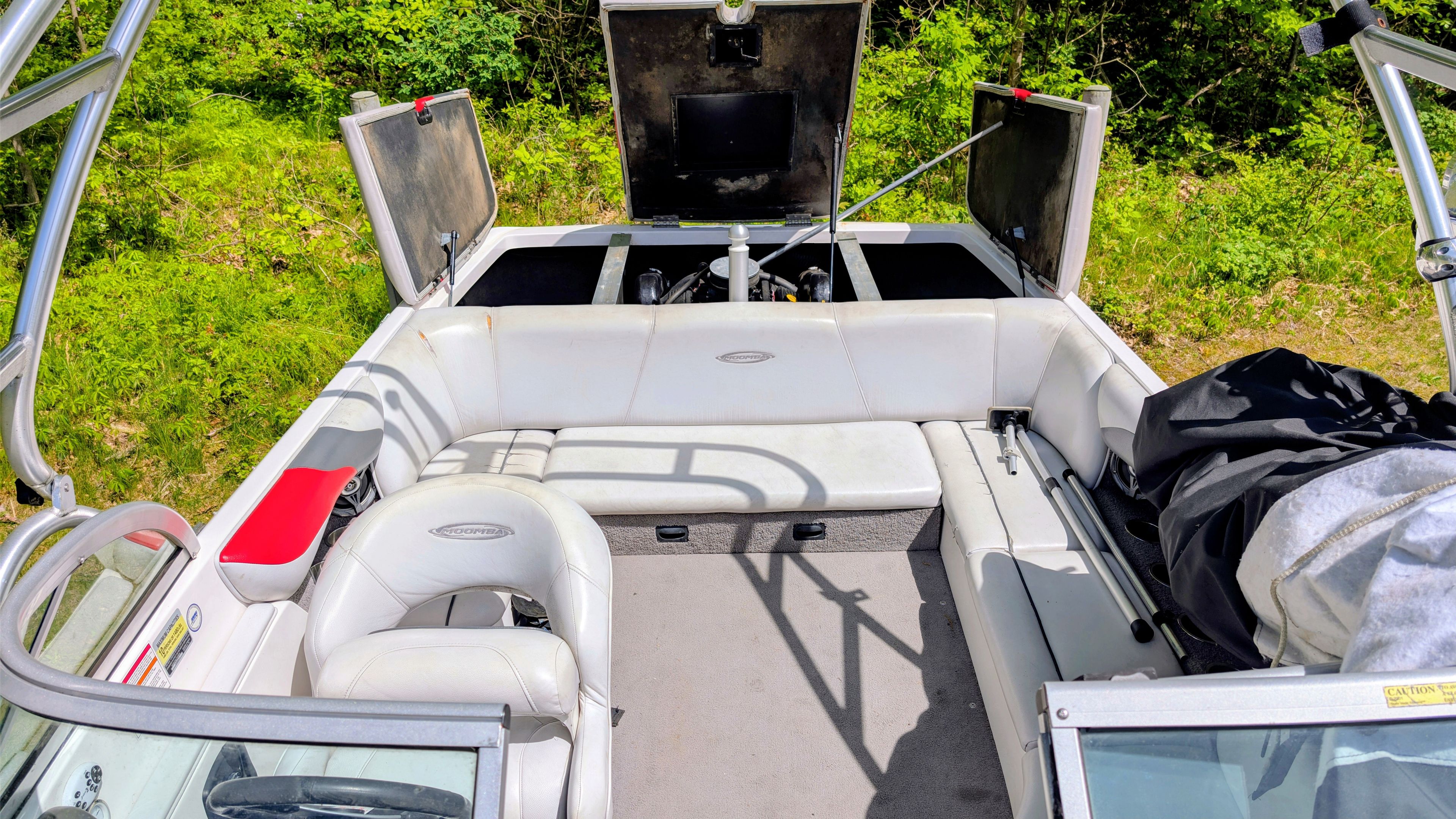 Interior of a 2007 Moomba Outback V boat with open engine compartment.