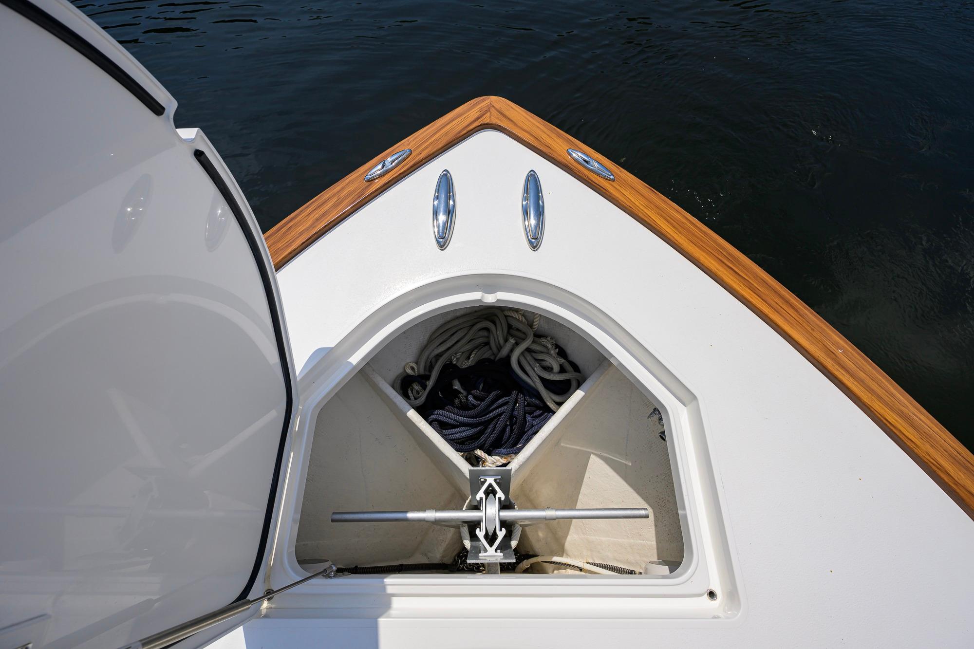 Bow of 2020 Valhalla Boatworks V-41 with open anchor locker and ropes.