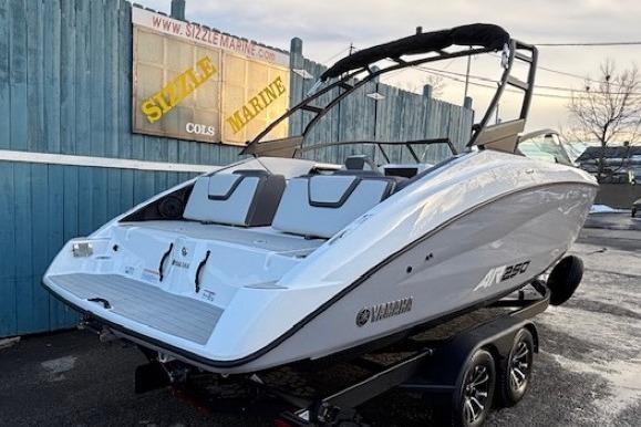 2026 Yamaha Boats AR250 on trailer, sleek design, parked outdoors.
