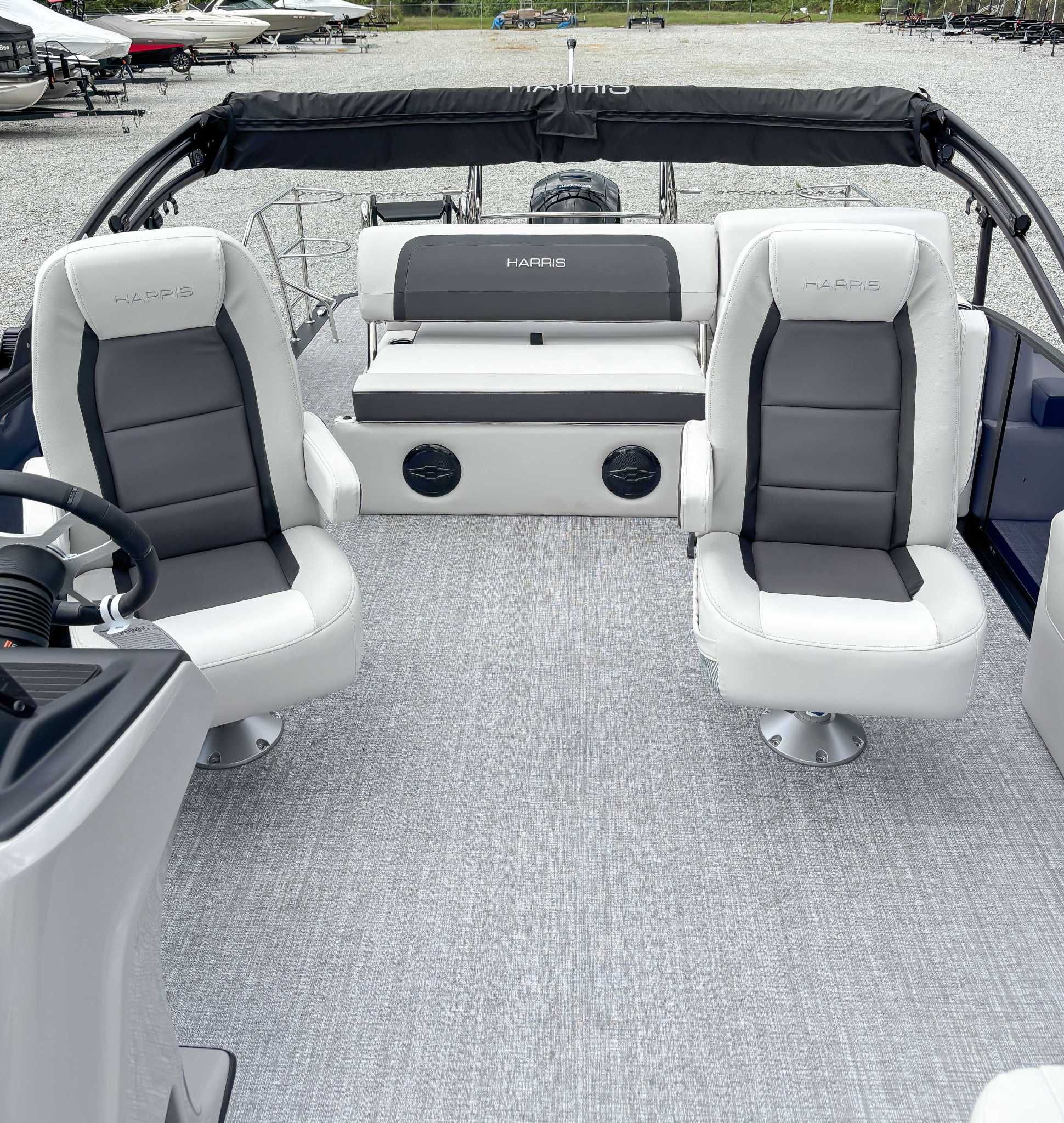 Interior of 2026 Harris Cruiser 230 SLDH with luxurious seating.