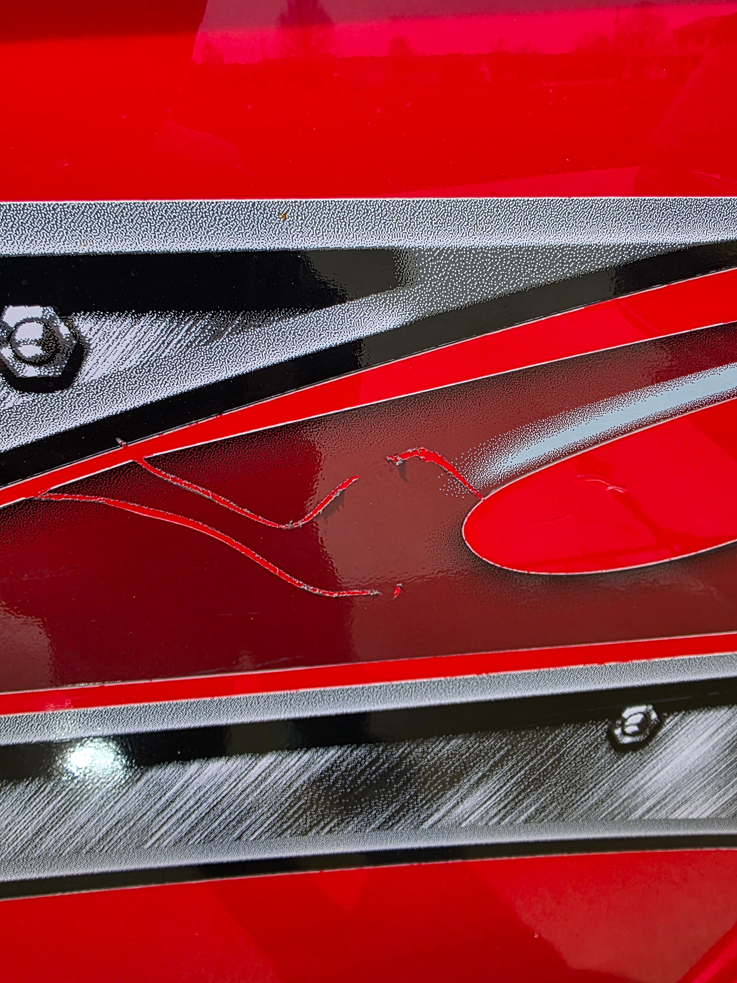 Close-up of a red 2007 MasterCraft X-15 boat design.
