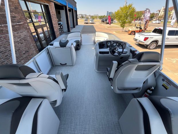 Interior of a 2025 Tahoe LTZ QL boat with luxurious seating.
