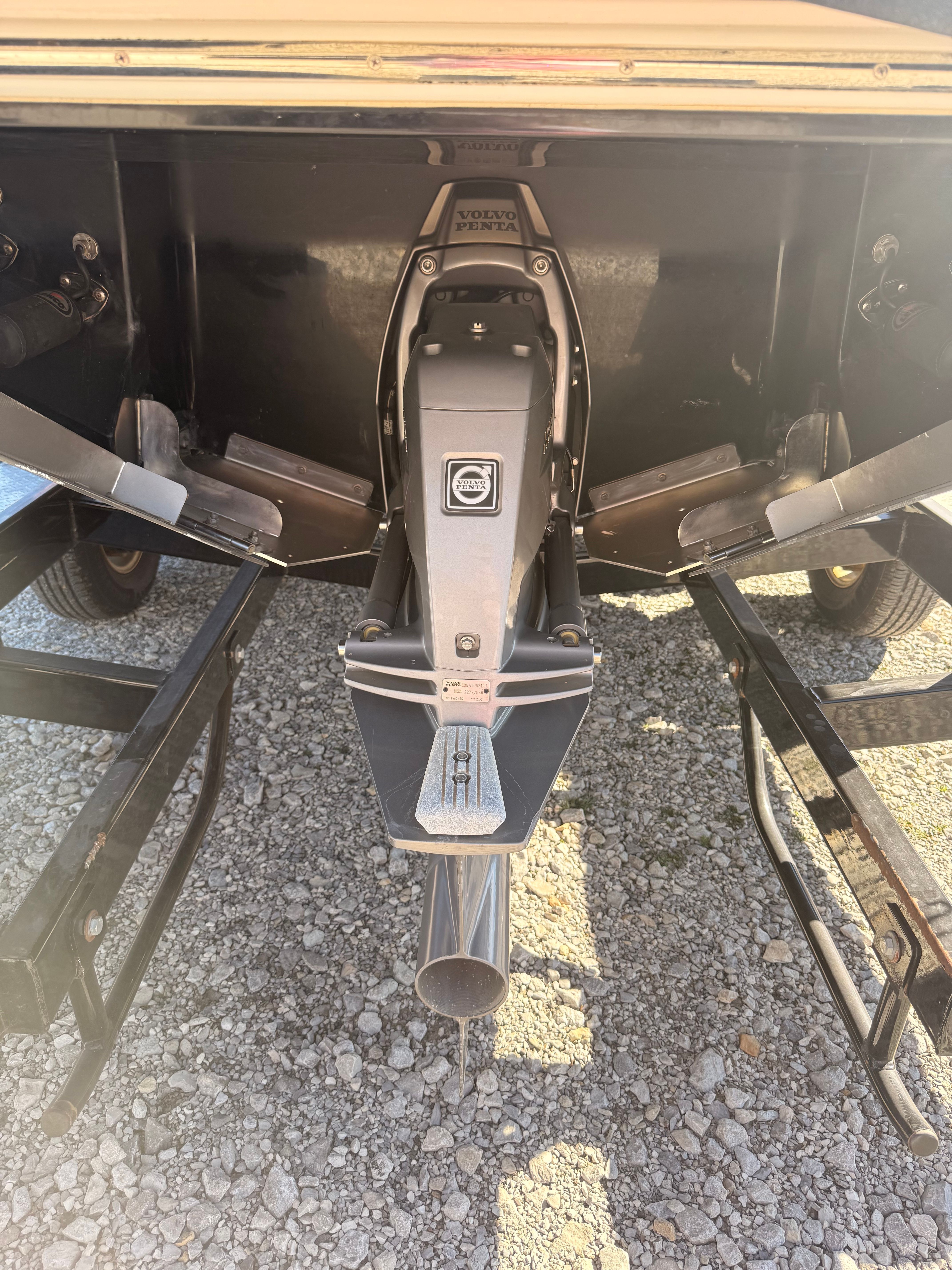 Close-up of the drive of a 2019 Cobalt R7 Surf boat on a trailer.